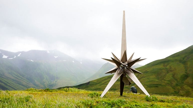 This Aug. 22, 2017, photo provided by the U.S. Fish and Wildlife Service, shows a titanium Peace Memorial at the crest of Engineer Hill on Attu Island, Alaska. One of the bloodiest World War II battles in the Pacific was waged 75 years ago this month on Attu Island in Alaska's Aleutian Islands. American forces reclaimed the island on Memorial Day 1943, 11 months after Japan seized it. (Lisa Hupp/U.S. Fish and Wildlife Service via AP)