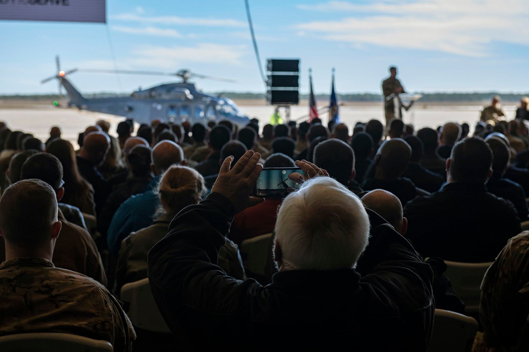A crowd attends the naming ceremony for the MH-139 helicopter Dec. 19, 2019, at Duke Field, Fla. Organizers announced the replacement for the UH-1N would be called the Grey Wolf because of it's tactical abilities. (Senior Airman Dylan M. Gentile/Air Force)
