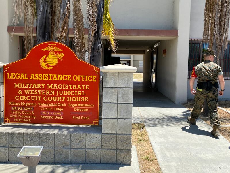 A guard walks into the Western Judicial Circuit Court House building aboard Camp Pendleton, California, on Thursday. (Jared Morgan/Staff)