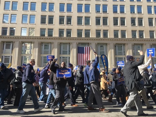 Union members protest outside the Department of Veterans Affairs headquarters in Washington on Feb 13, 2018. (Leo Shane III/Staff)
