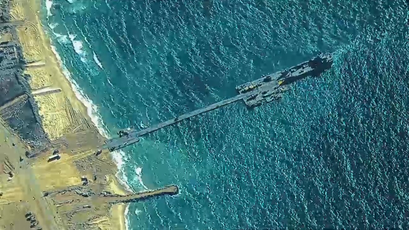 An aerial photo of the U.S. military-built Gaza aid pier after it was stabbed into the beach on May 16. (DOD)