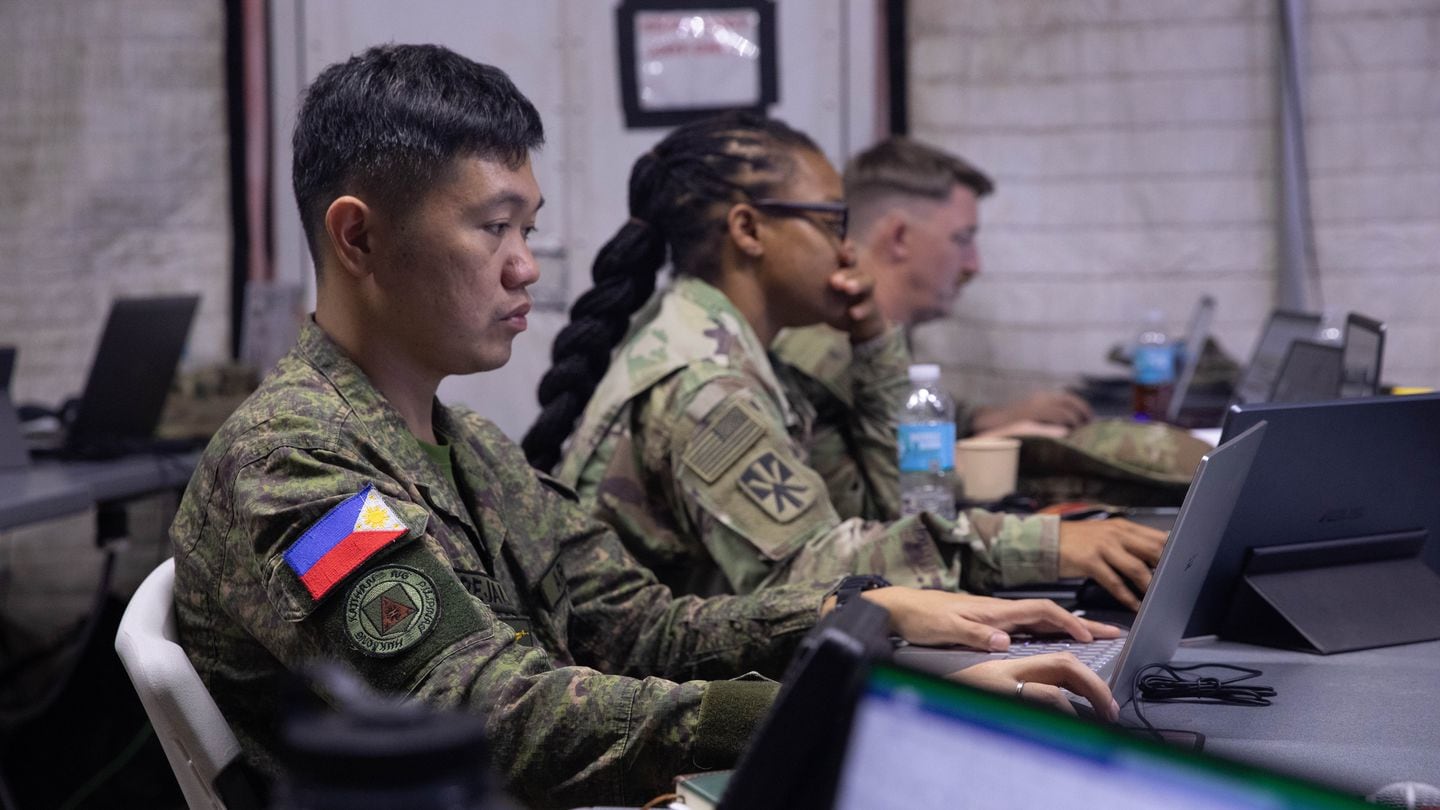 American and Filipino soldiers monitor personnel actions on May 31, 2024, during the Joint Pacific Multinational Readiness Center-Exportable exercise on Fort Magsaysay, Philippines. (Staff Sgt. Tommie Berry/U.S. Army National Guard)
