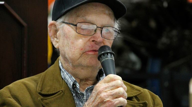 In this May 19, 2018, photo World War II veteran William Roy Dover, of Haleyville, Ala., speaks at a 75th anniversary celebration of the Battle of Attu in Anchorage, Alaska. Dover was an American soldier who took part in the May 1943 effort to reclaim Alaska's Attu Island from the Japanese. It was the only World War II battle fought on North American soil. (Mark Thiessen/AP)