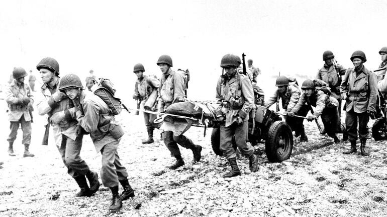 In this June 23, 1943, file photo, U.S. Army reinforcements land on a beach during World War II on Attu Island, part of the Aleutian Islands of Alaska. May 30, 2018 will mark the 75th anniversary of American forces recapturing Attu Island in Alaska's Aleutian chain from Japanese forces. It was the only World War II battle fought on North American soil. (AP)