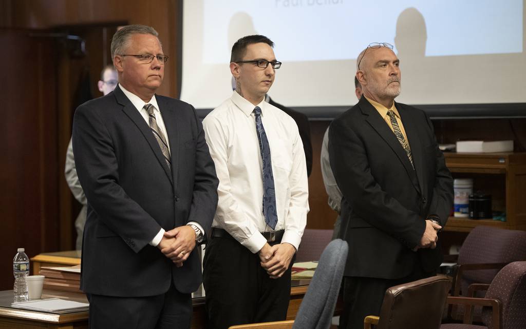 Paul Bellar, middle, appears before Jackson County Circuit Court Judge Thomas Wilson on Wednesday, Oct. 5, 2022 for trial in Jackson, Mich.
