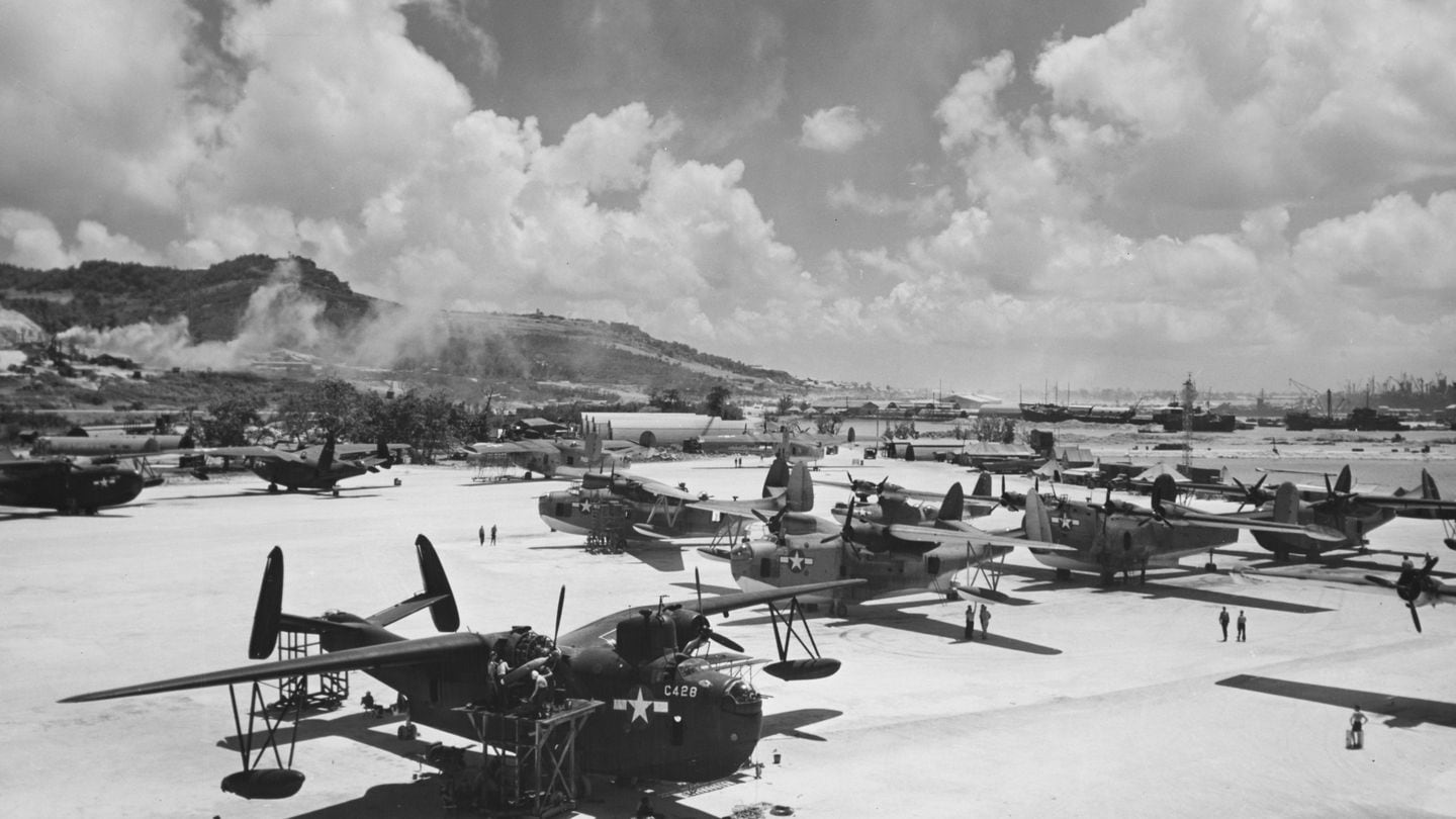 A U.S. Navy Martin PBM Mariner bomber and a Consolidated PB2Y Coronado amphibious aircraft undergo maintenance around August 1945 at a base in the Mariana Islands of the Pacific Ocean. (Keystone/Hulton Archive via Getty Images)