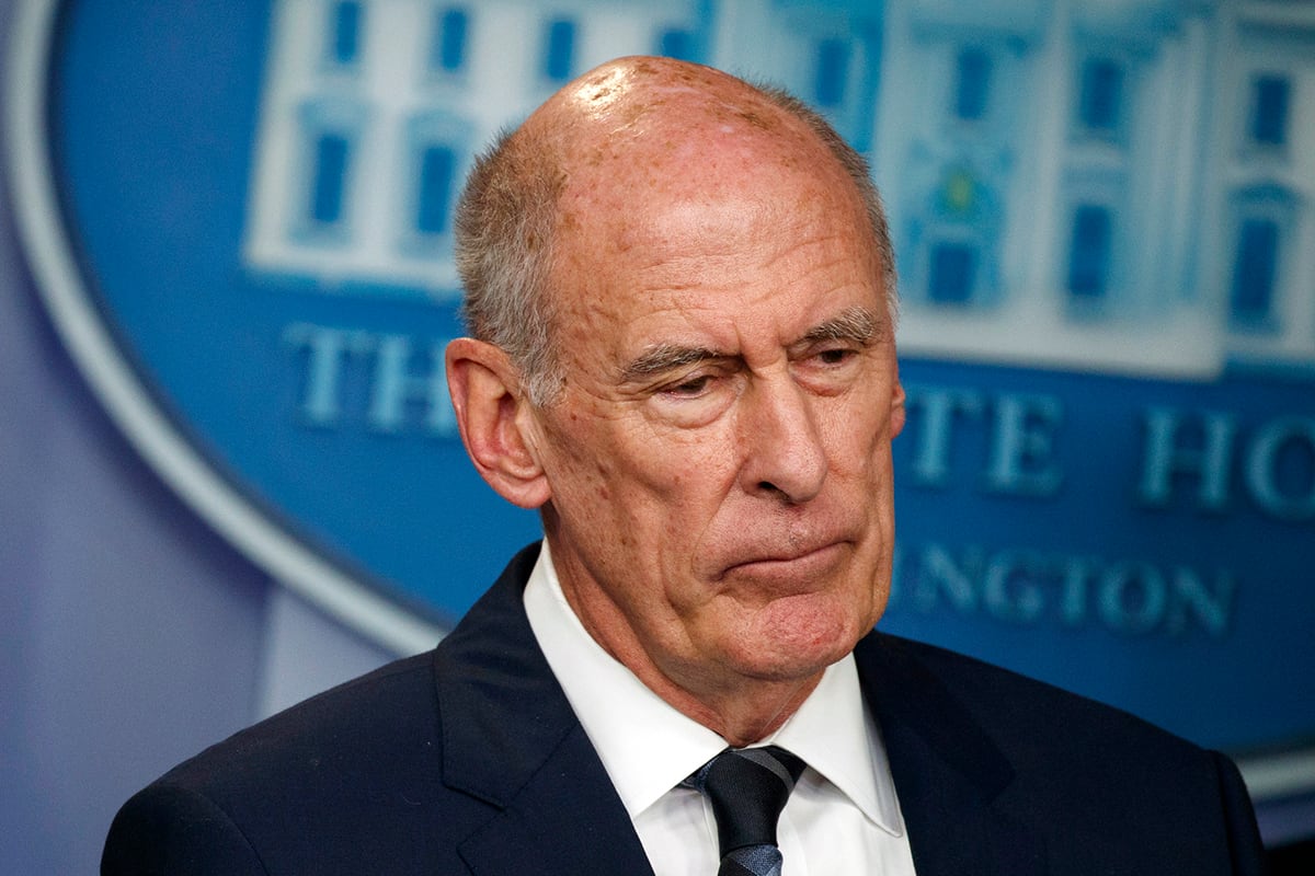 In this Aug. 2, 2018, file photo, Director of National Intelligence Dan Coats listens during a daily press briefing at the White House in Washington.