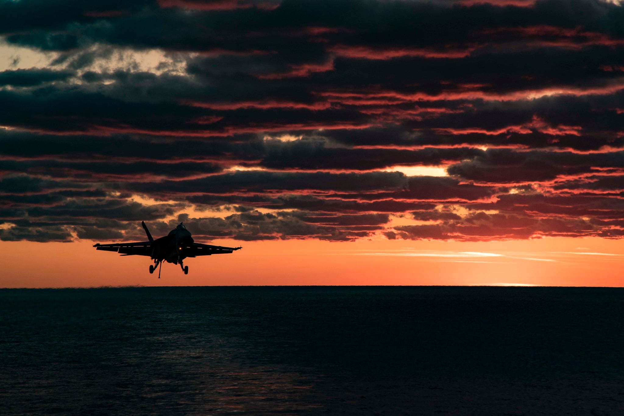 An F/A-18E Super Hornet prepares to make an arrested landing on the flight deck of the aircraft carrier USS Dwight D. Eisenhower (CVN 69) on April 9, 2017.