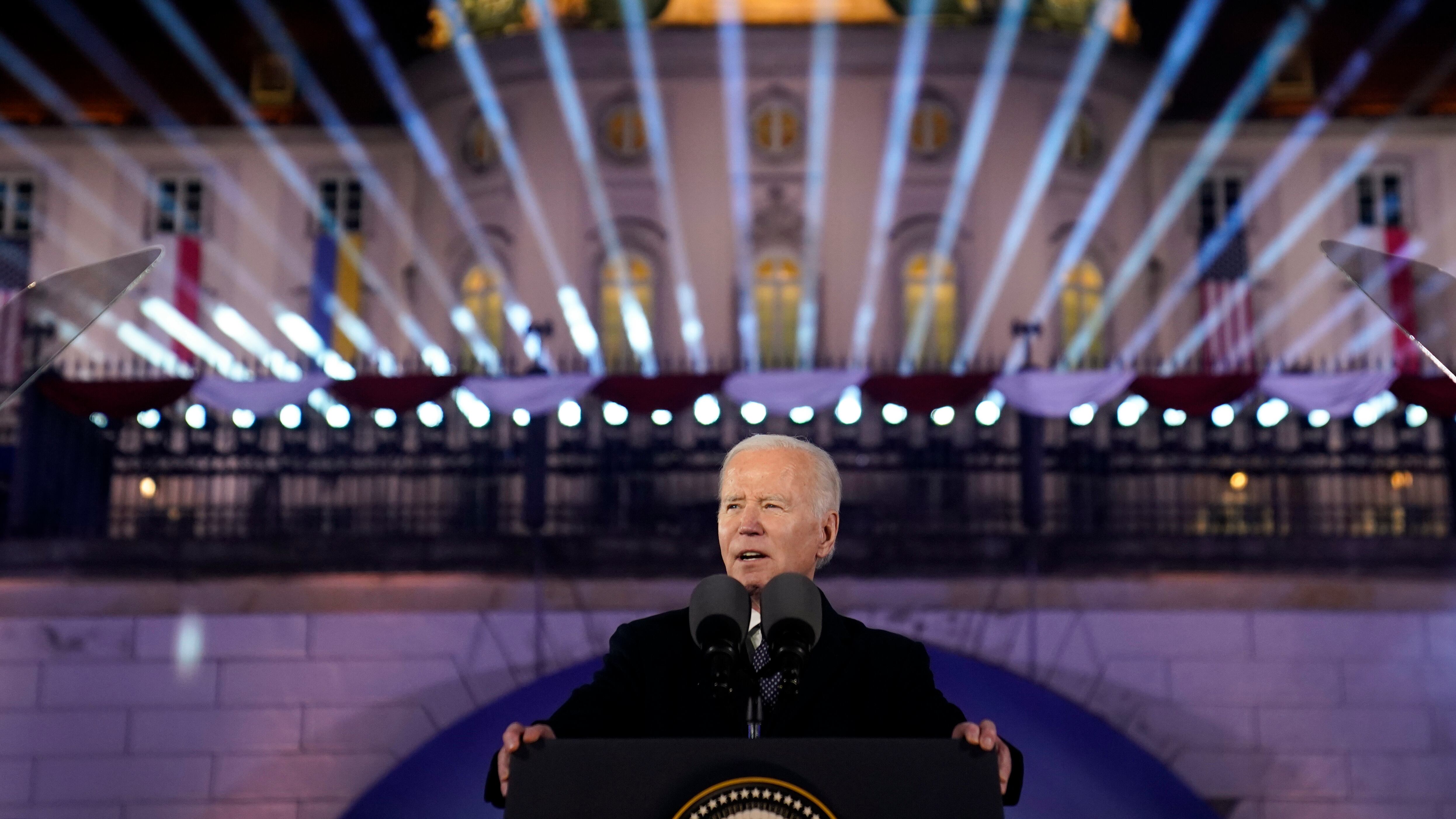 President Joe Biden delivers a speech marking the one-year anniversary of the Russian invasion of Ukraine, Tuesday, Feb. 21, 2023, at the Royal Castle Gardens in Warsaw.