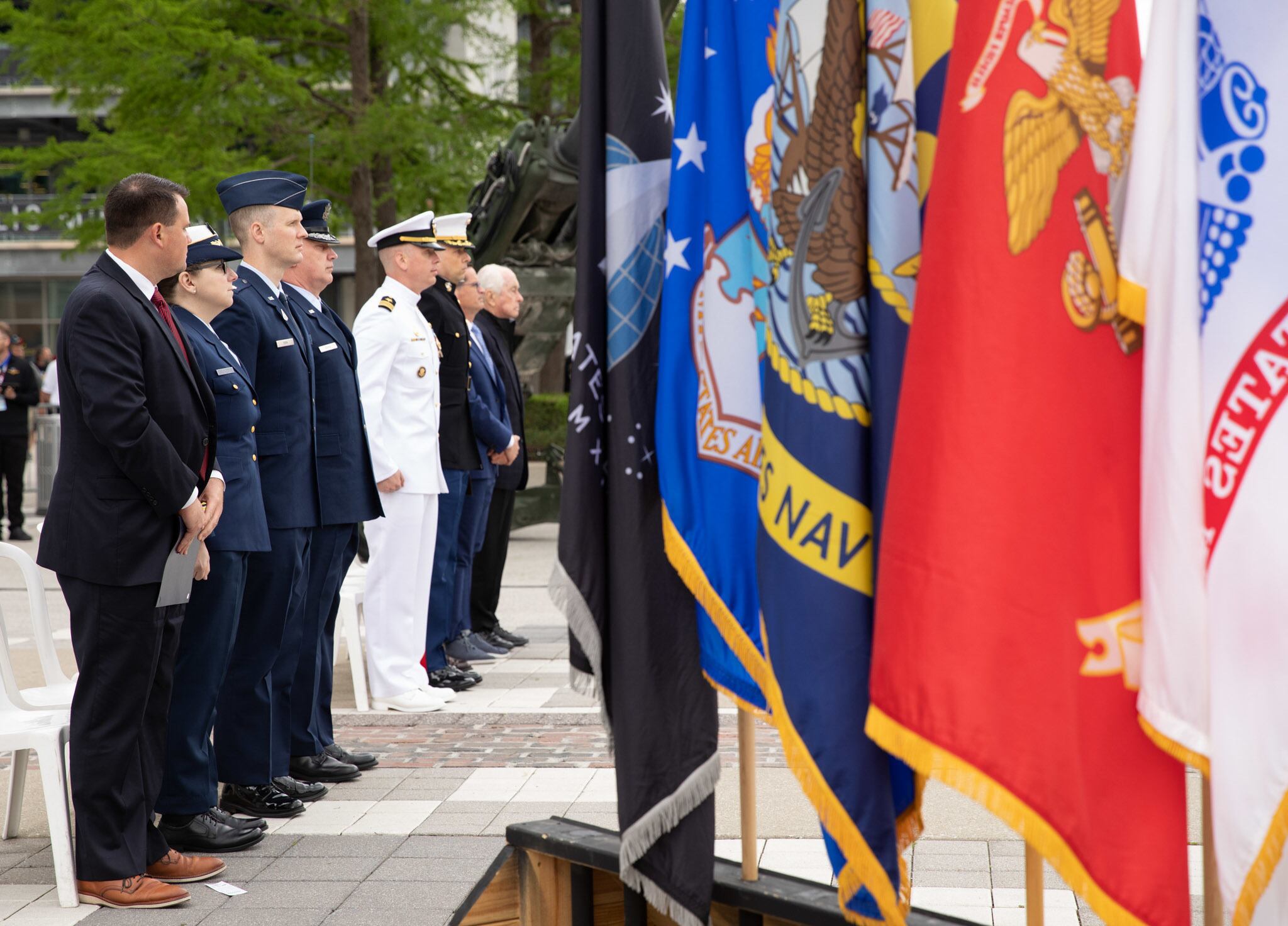 Service members participate in a joint enlistment ceremony at the Indianapolis Motor Speedway in Speedway, Ind., May 22, 2022.