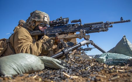 Hospital Corpsman 3rd Class Neil Rioja participates in live-fire M240B machine gun range training Feb. 9, 2021, during Artillery Relocation Training Program 20.4 at Combined Arms Training Center, Camp Fuji, Japan.