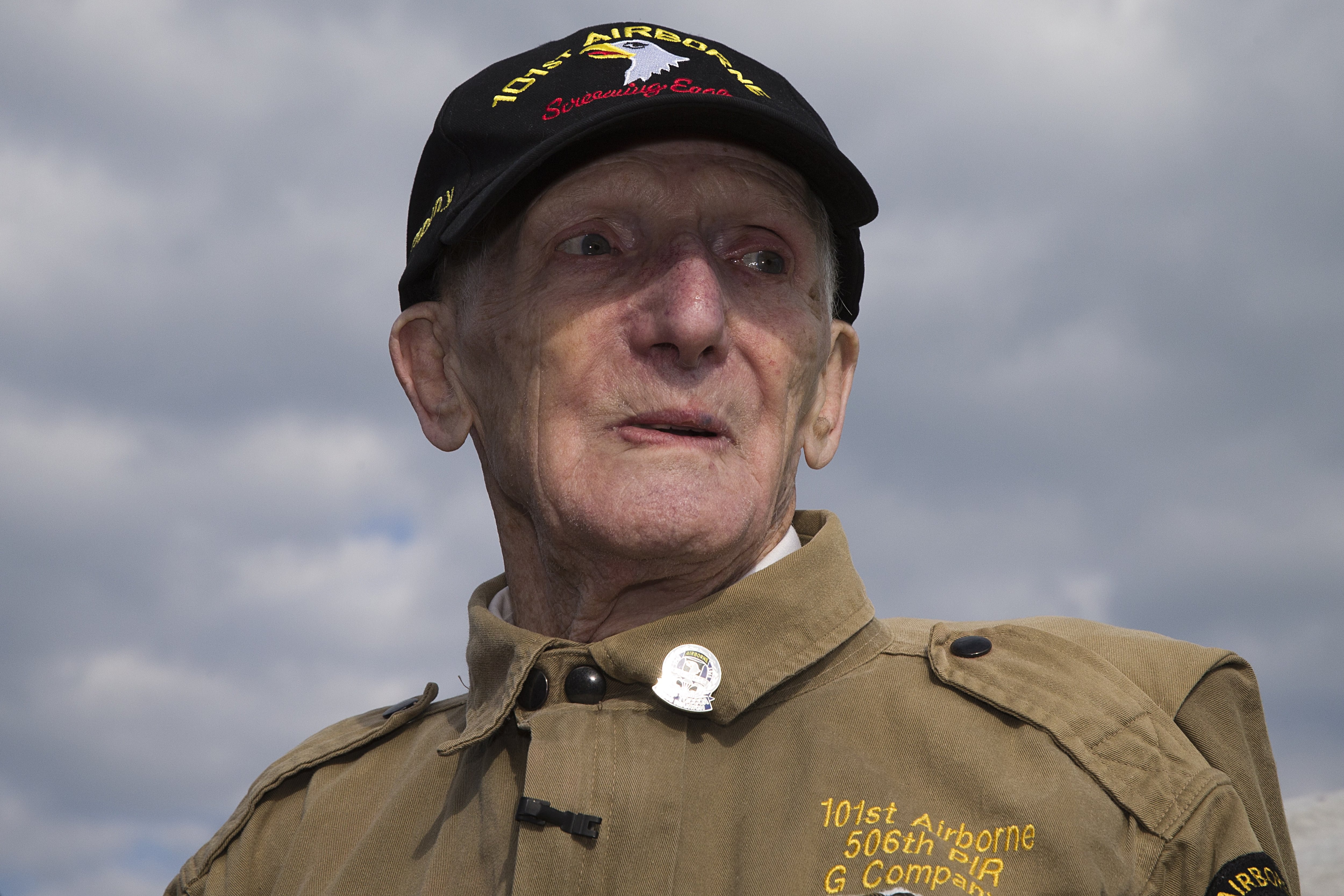 Army veteran Jim "Pee Wee" Martin reacts after a parachute tandem jump on June 5, 2014 in Carentan, Normandy, where he landed 70 years ago, when he was a paratrooper.