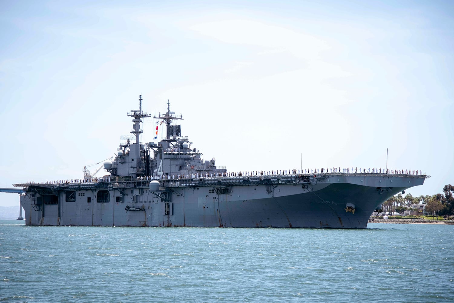 In this May 1, 2019, photo provided by the U.S. Navy, the amphibious assault ship USS Boxer (LHD 4) transits the San Diego Bay in San Diego, Calif.