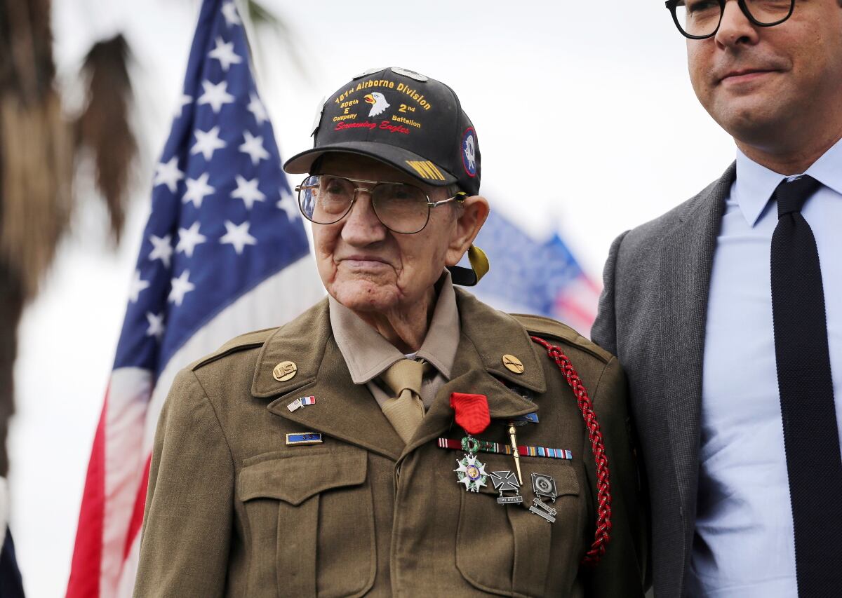 In this Sept. 19, 2017, file photo, U.S. Army Pvt. Henry L. Ochsner is awarded the National Order of the Legion of Honor, the French government's highest honor, from Christophe Lemoine, France Consul General in Los Angeles, during a ceremony at Los Angeles National Cemetery.