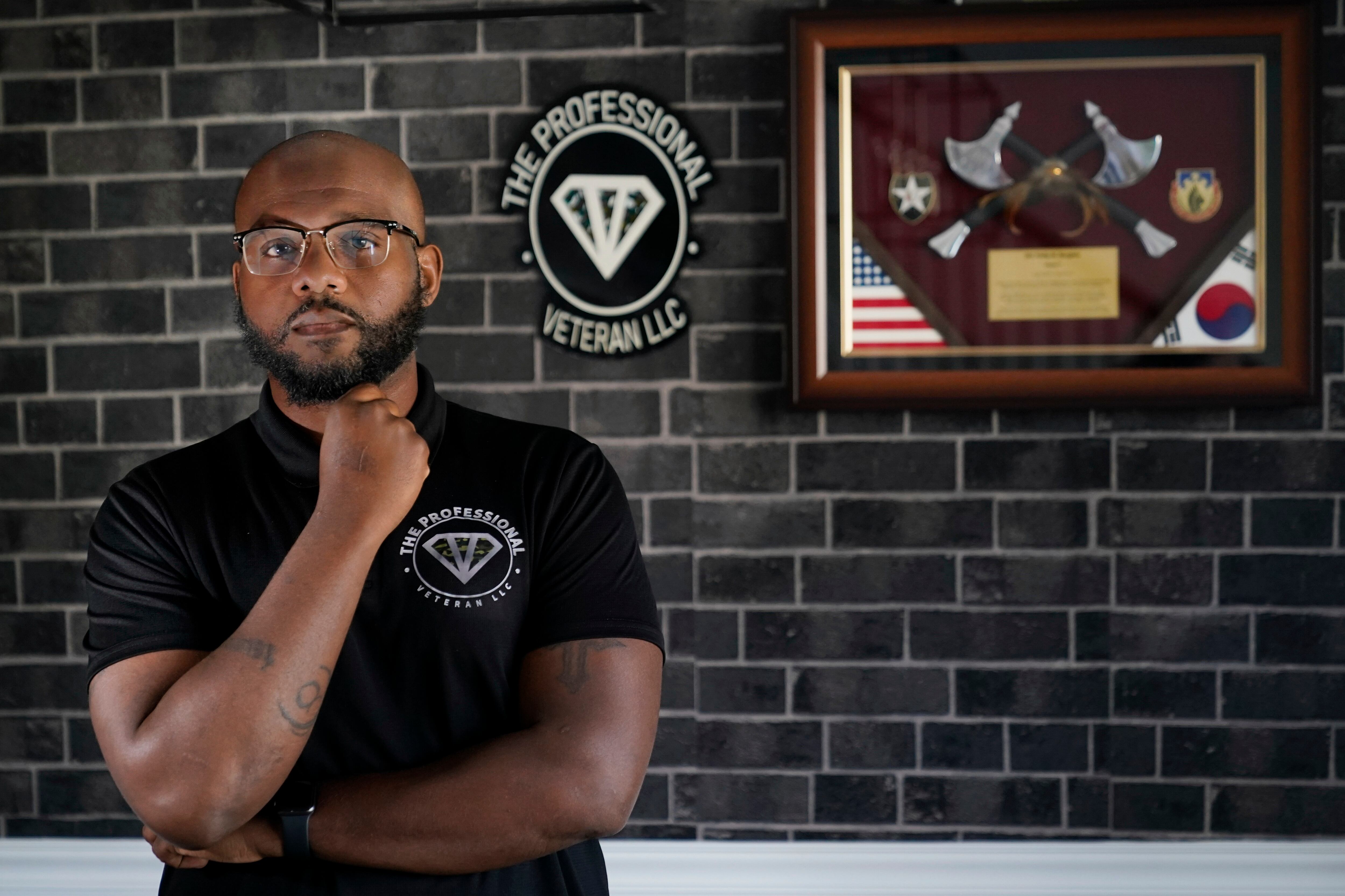 Phillip Slaughter, who served in the U.S. Army for 18 years, poses in his home Nov. 10, 2022, in Clarksville, Tenn.