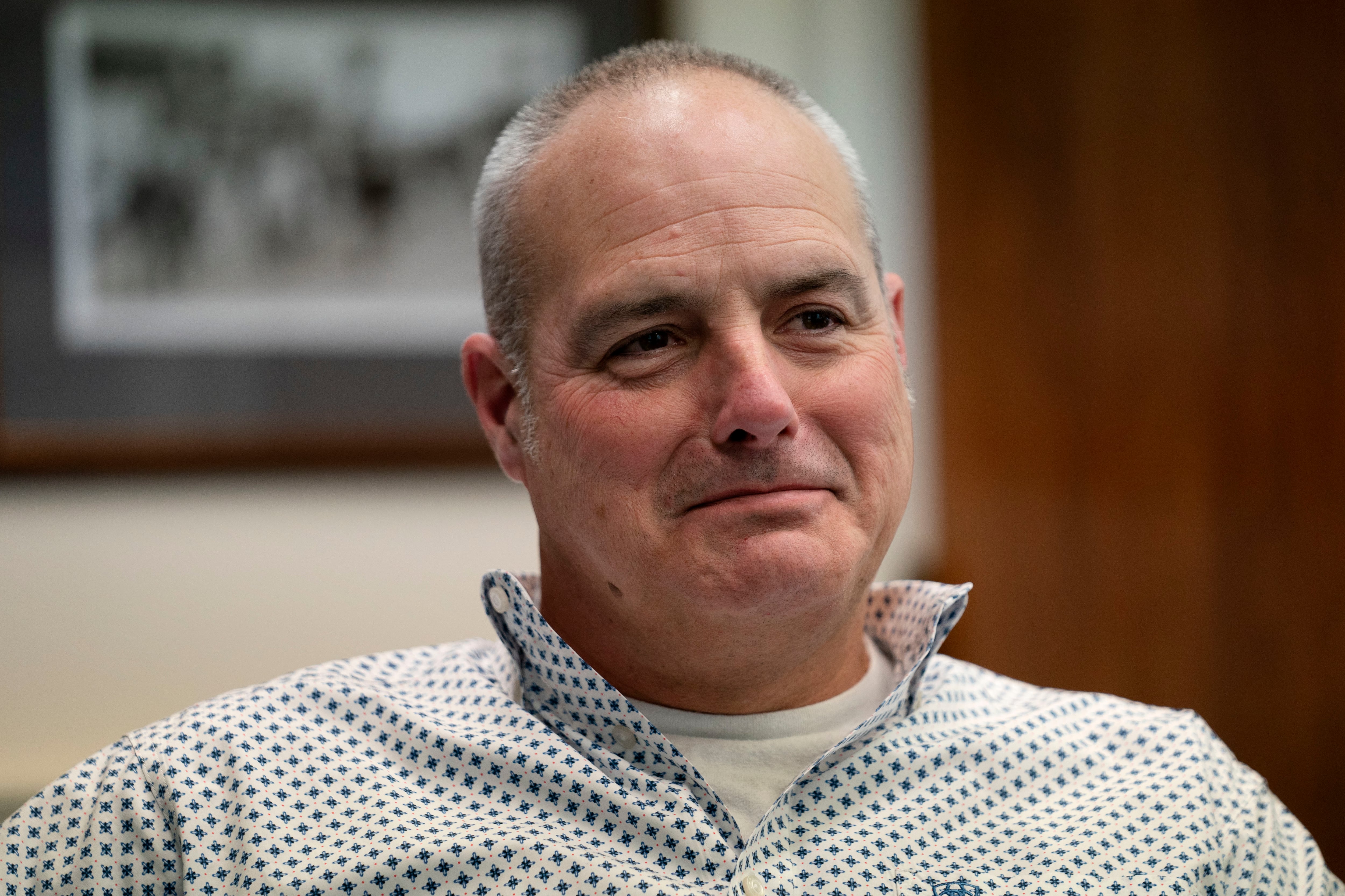 Charles F. Krugh, president of Bath Iron Works, listens during a meeting at his office at the shipyard, Tuesday, Dec. 20, 2022, in Bath, Maine.