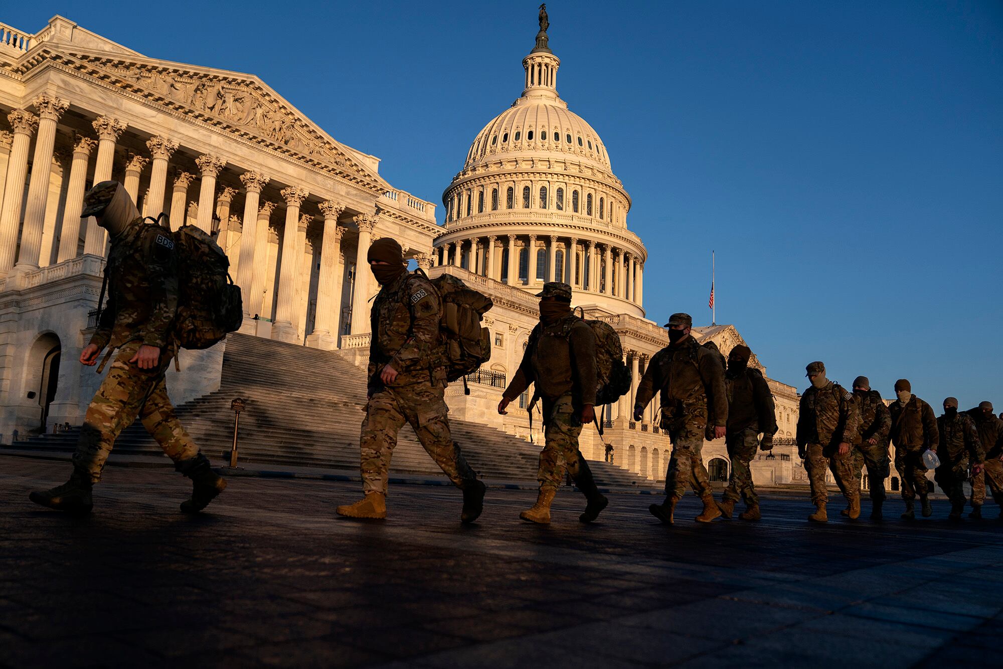 Members of the National Guard gather outside the U.S. Capitol on Jan. 12, 2021, in Washington.