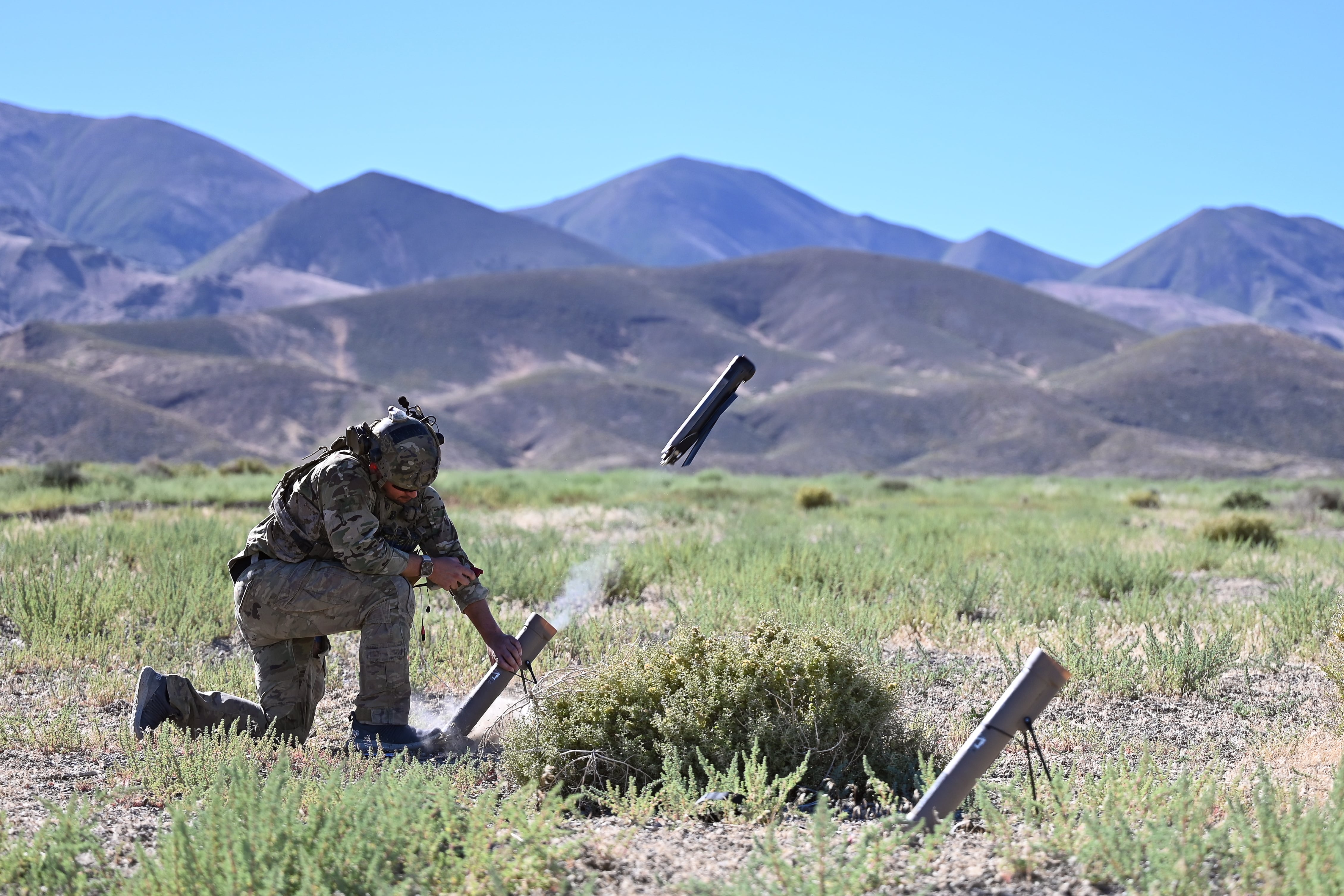 A West Coast-based naval special warfare operator fires a Switchblade 300 Lethal Miniature Aerial Munition System during a training exercise.