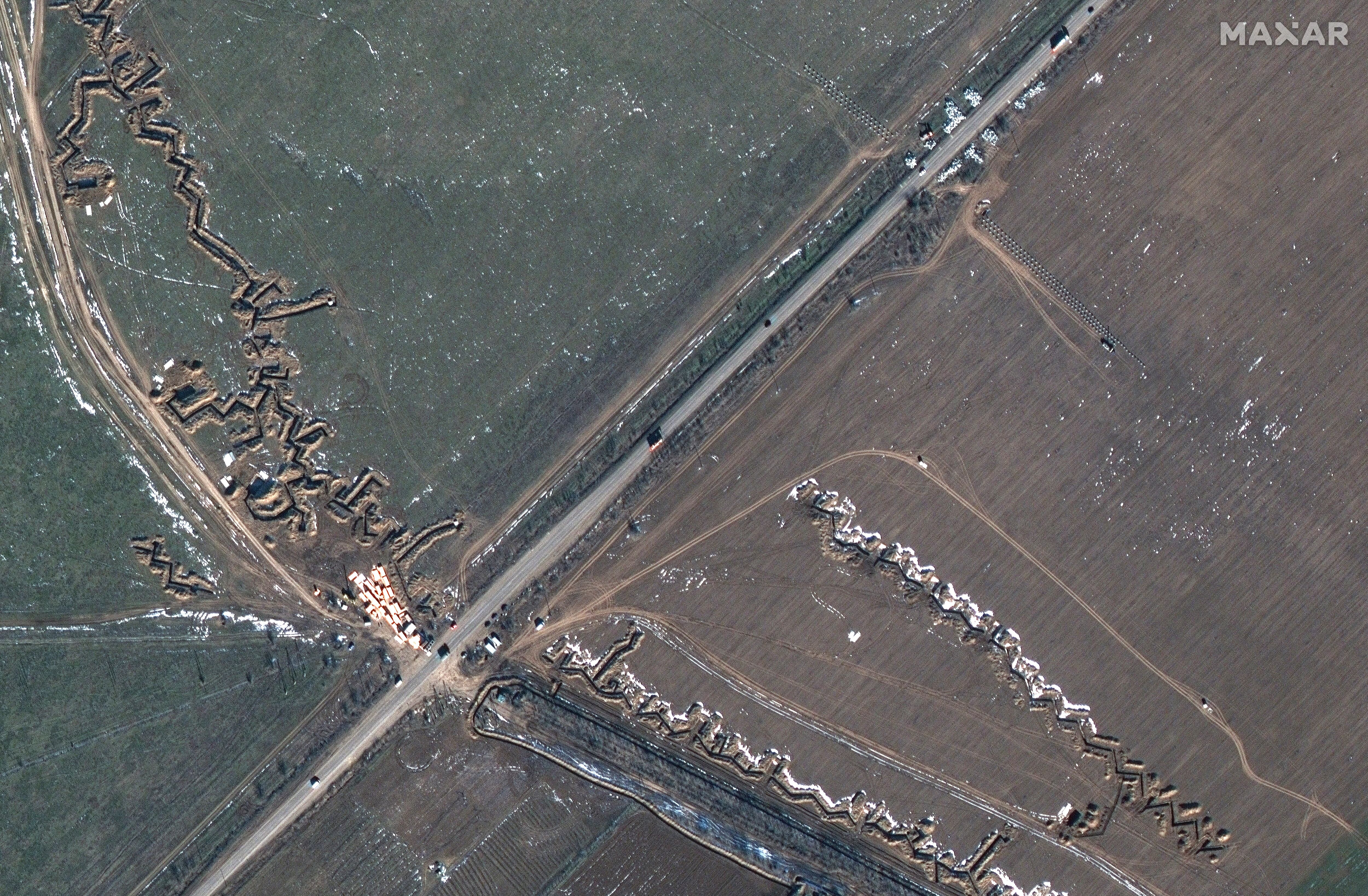 This satellite image provided by Maxar Technologies shows fortifications and dragons in Medvedivka, Crimea, Feb. 11, 2023.