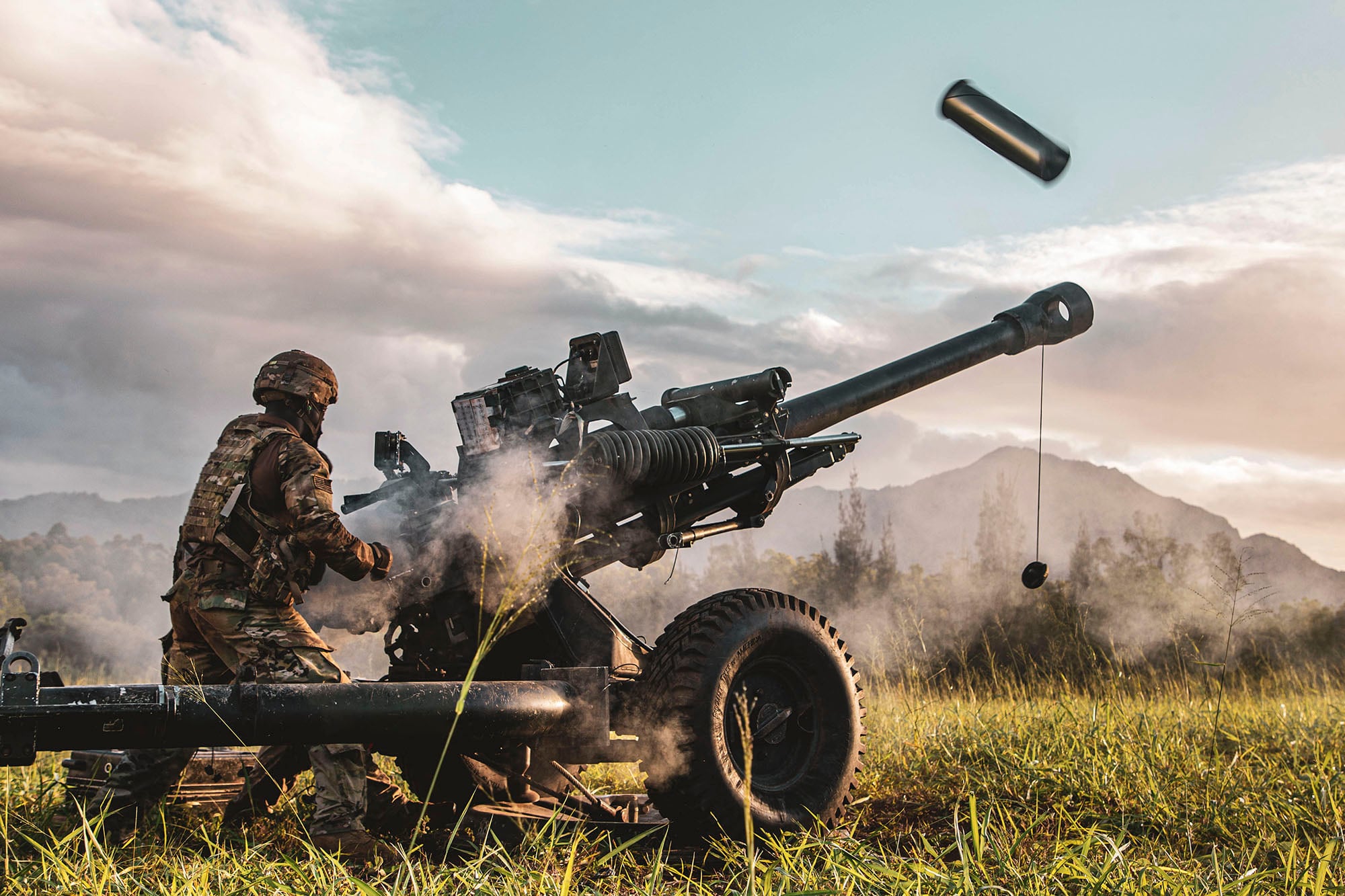 Service members participate in an exercise called Operation Wardog Kila for a joint live-fire exercise at Schofield Barracks, Hawaii, Dec. 30, 2020, with the 25th Combat Aviation Brigade, 25th Infantry Division Artillery units and the U.S. Marine Corps.