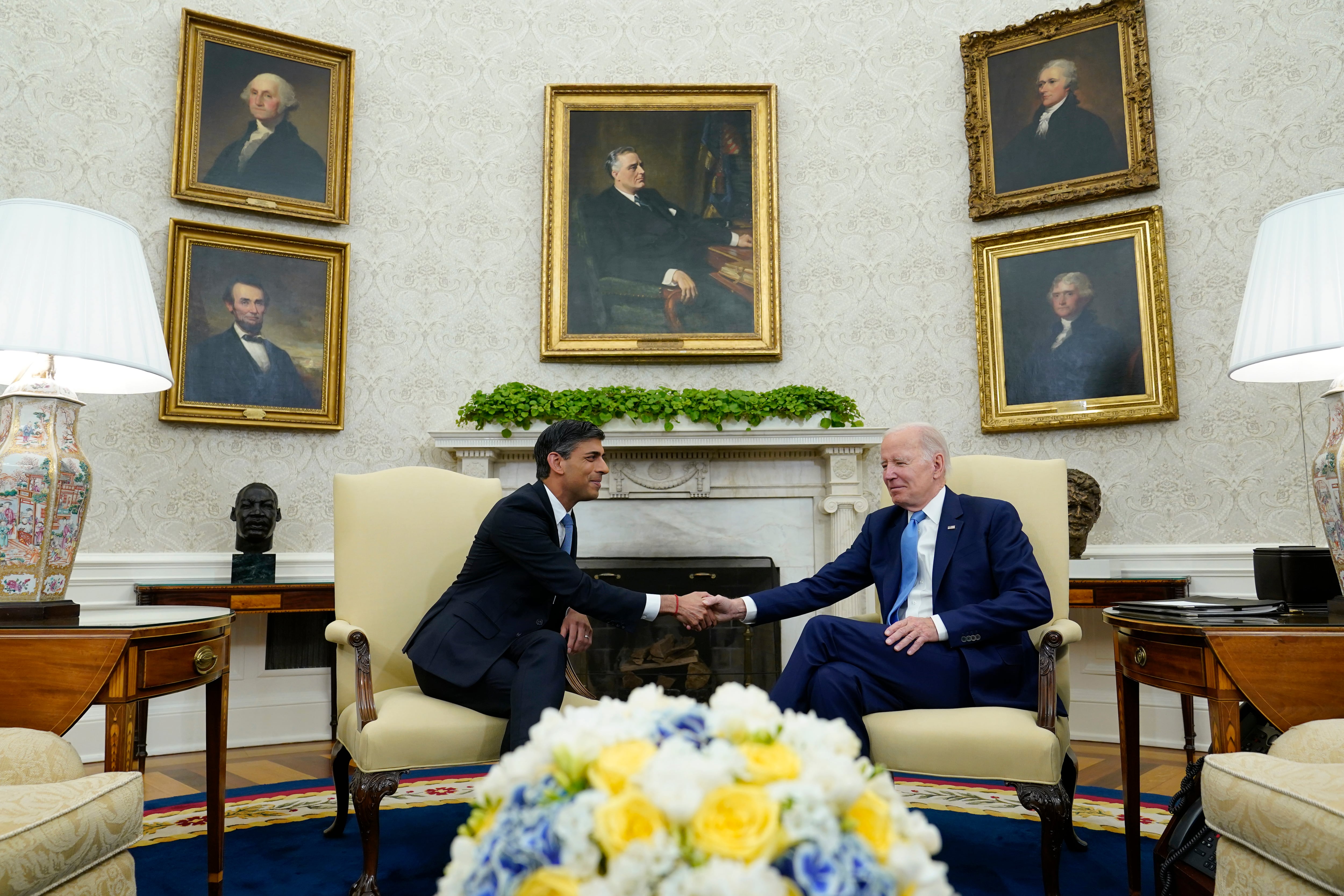 President Joe Biden shakes hands with British Prime Minister Rishi Sunak as they meet in the Oval Office of the White House in Washington, Thursday, June 8, 2023.