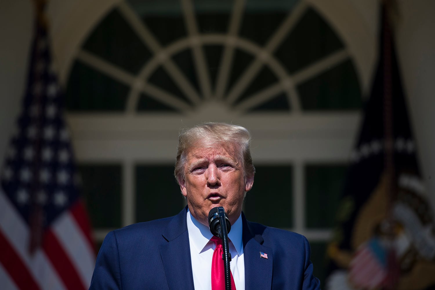 In this July 29, 2019, photo, President Donald Trump speaks before signing H.R. 1327, an act ensuring that a victims' compensation fund related to the Sept. 11 attacks never runs out of money, in the Rose Garden of the White House in Washington.