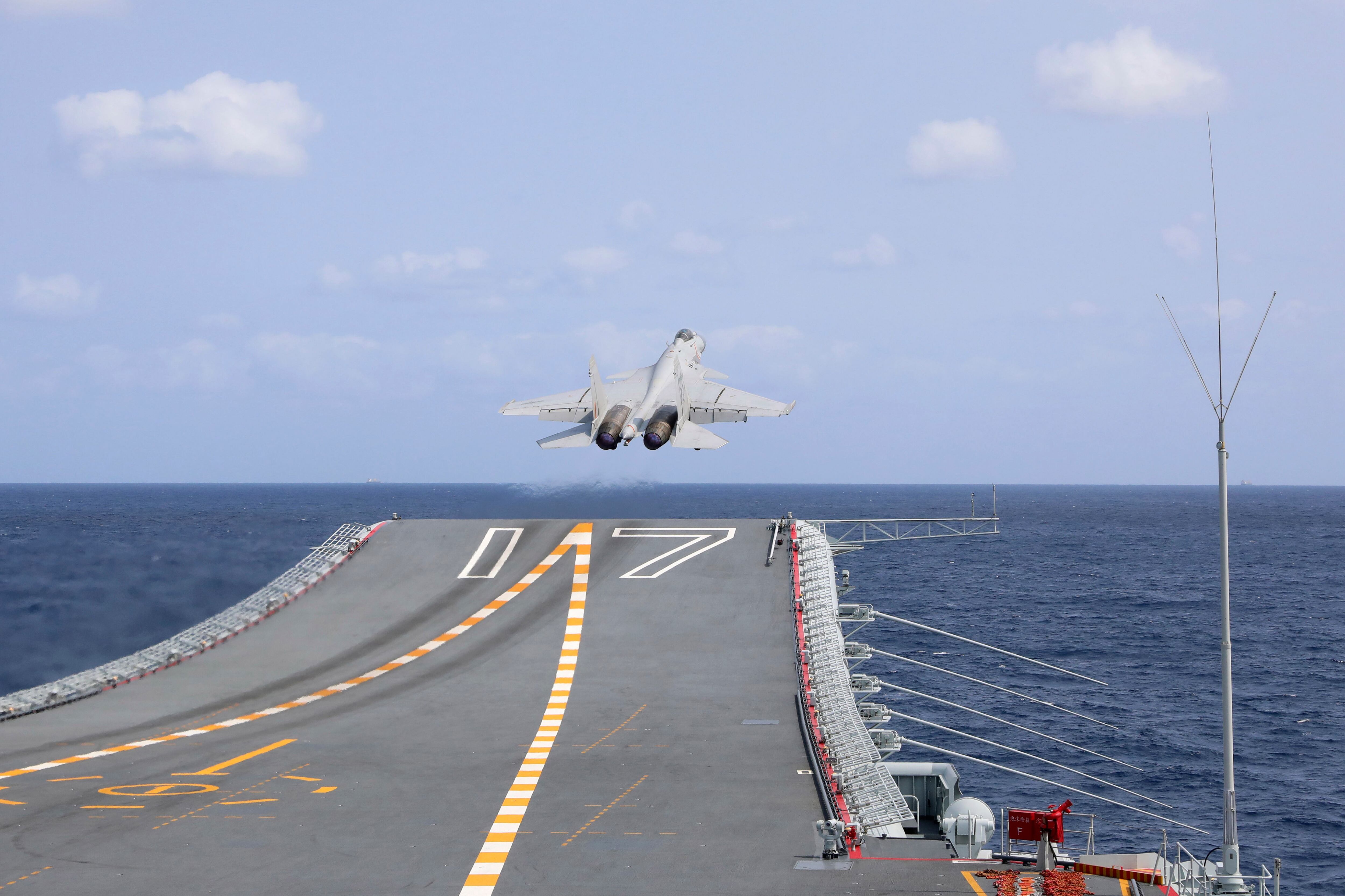 In this photo released by Xinhua News Agency, a J-15 Chinese fighter jet takes off from the Shandong aircraft carrier during the combat readiness patrol and military exercises around the Taiwan Island by the Eastern Theater Command of the Chinese People's Liberation Army on, April 9, 2023.