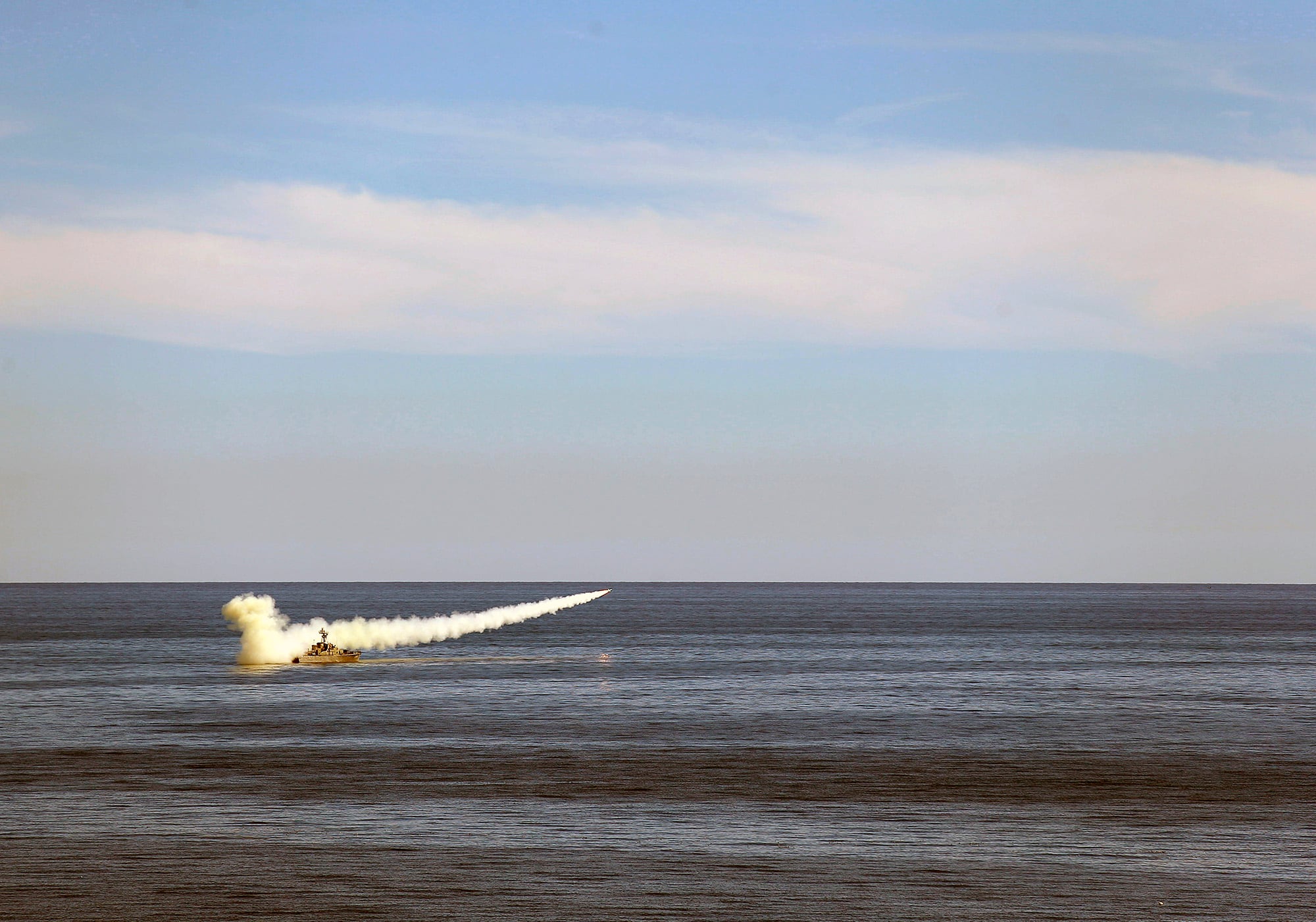 In this image released Thursday, Jan. 14, 2021, by the Iranian Army, a missile is launched from a warship during a naval drill.