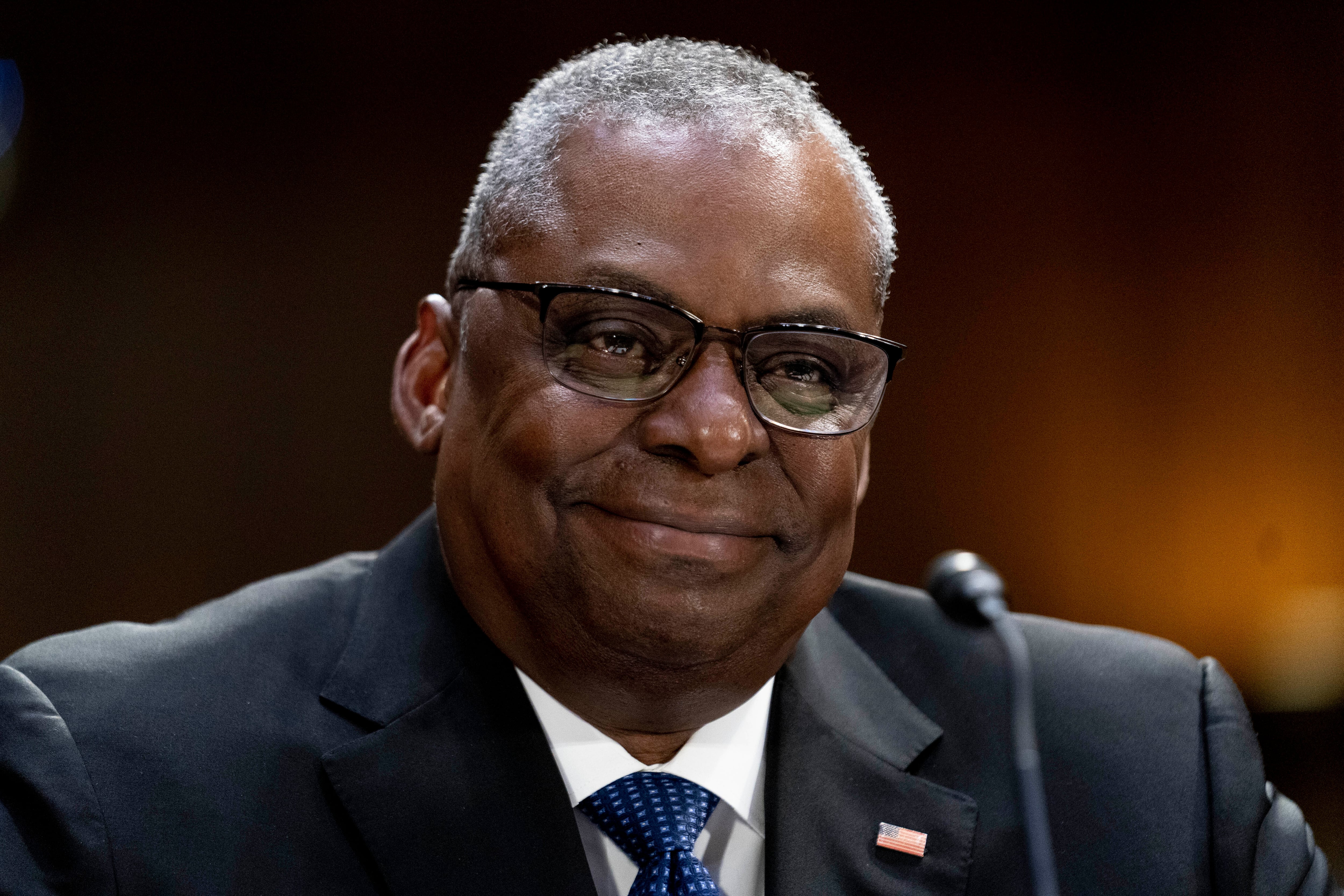 Secretary of Defense Lloyd Austin smiles as he appears before a Senate Appropriations hearing on the President's proposed budget request for fiscal year 2024, on Capitol Hill in Washington, Tuesday, May 16, 2023.