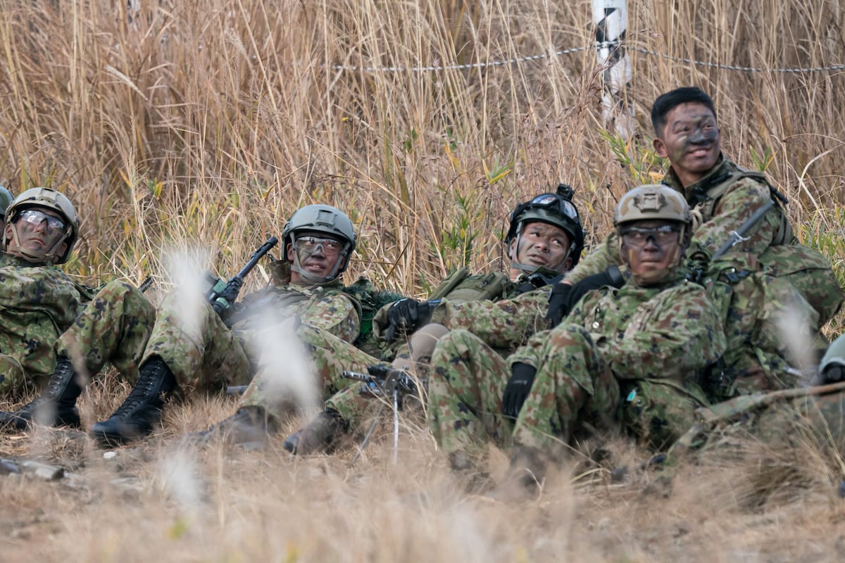 Japan passes record defense budget, while still playing catch-up