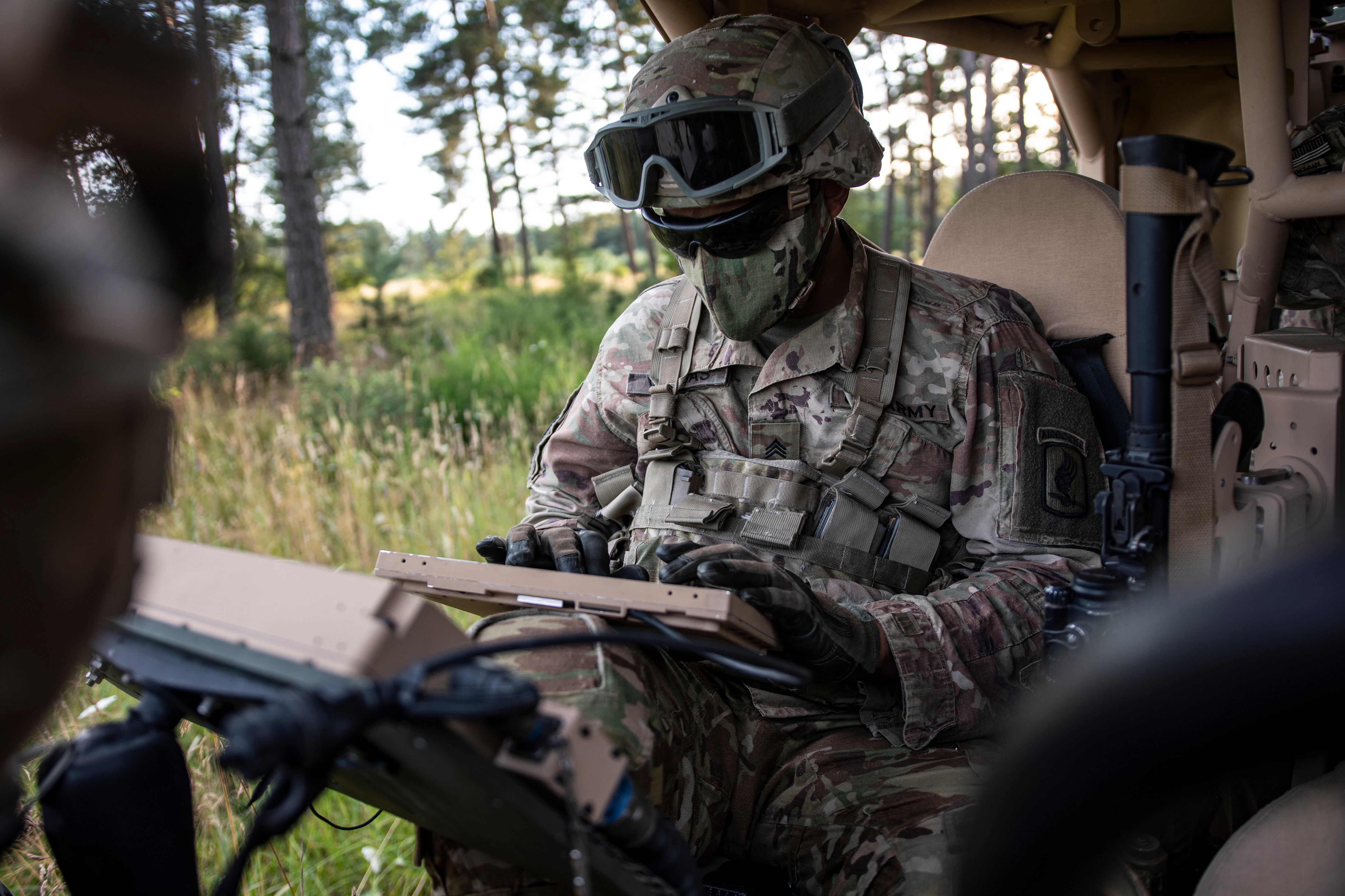 Sgt. Vargas, a U.S. Army paratrooper assigned to 54th Brigade Engineer Battalion, 173rd Airborne Brigade, uses electronic warfare equipment at Grafenwoehr Training Area, Germany, July 28, 2020.