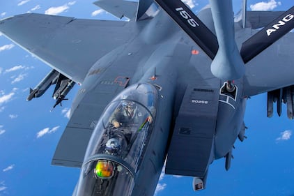 An Air Force F-15E Strike Eagle prepares to receive from a KC-135 Stratotanker during Emerald Flag over the Gulf of Mexico, Dec. 3, 2020.