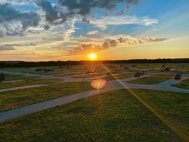 The sun sets behind an airfield at the 28th Expeditionary Combat Aviation Brigade's mobilization station at Fort Hood, Texas.