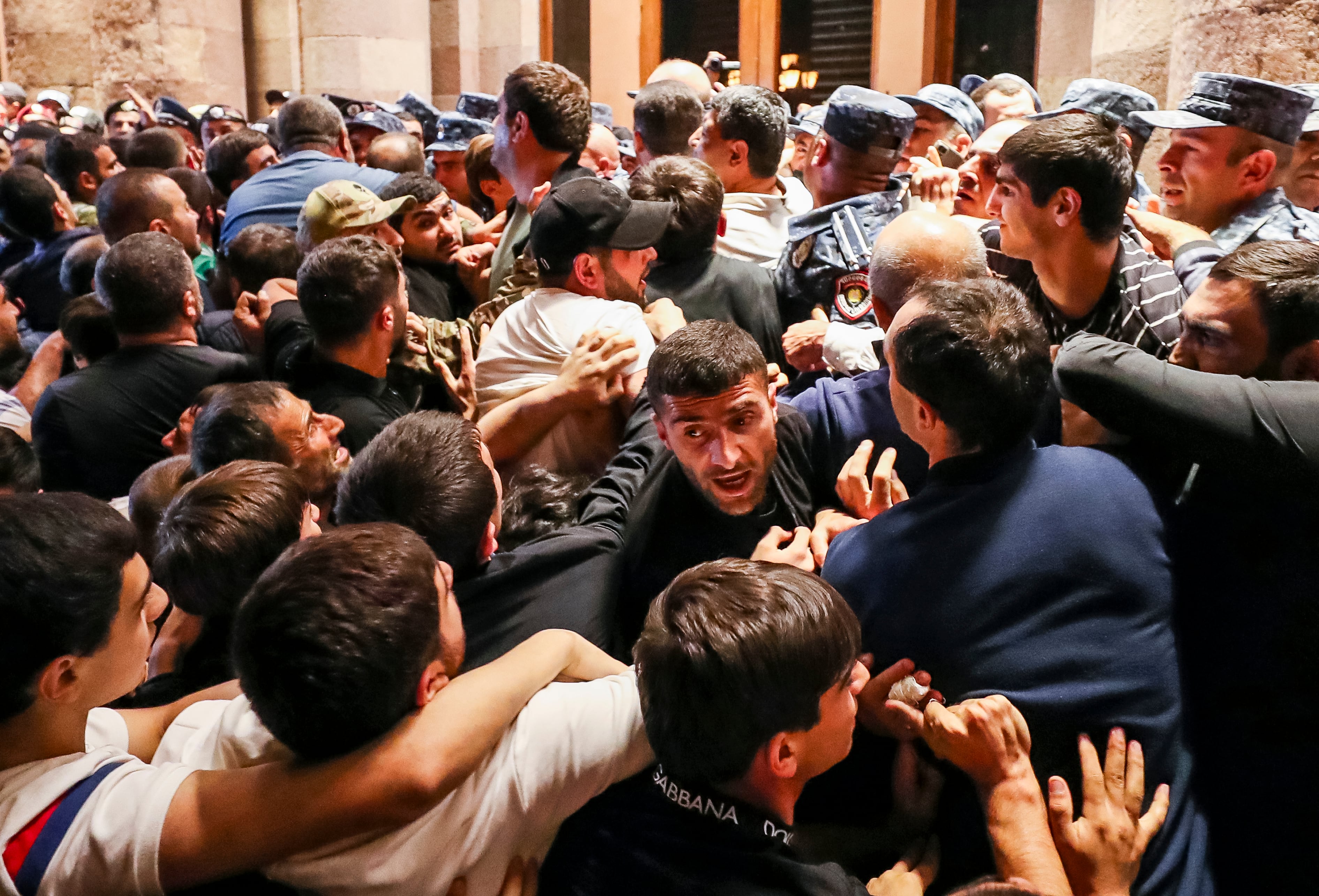 Demonstrators clash with police at the Armenia government building to protest against Prime Minister Nikol Pashinyan, Tuesday, Sept. 19, 2023, in Yerevan, Armenia.