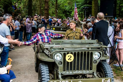 WWII veterans are greeted by a crowd at the 3rd ID Old Hickory memorial ceremony at Mortain, France on June 2, 2019.