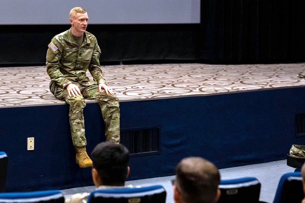 Capt. Anthony Priest, behavior health officer with 1st Signal Brigade, speaks about mental health issues July 26, 2022.