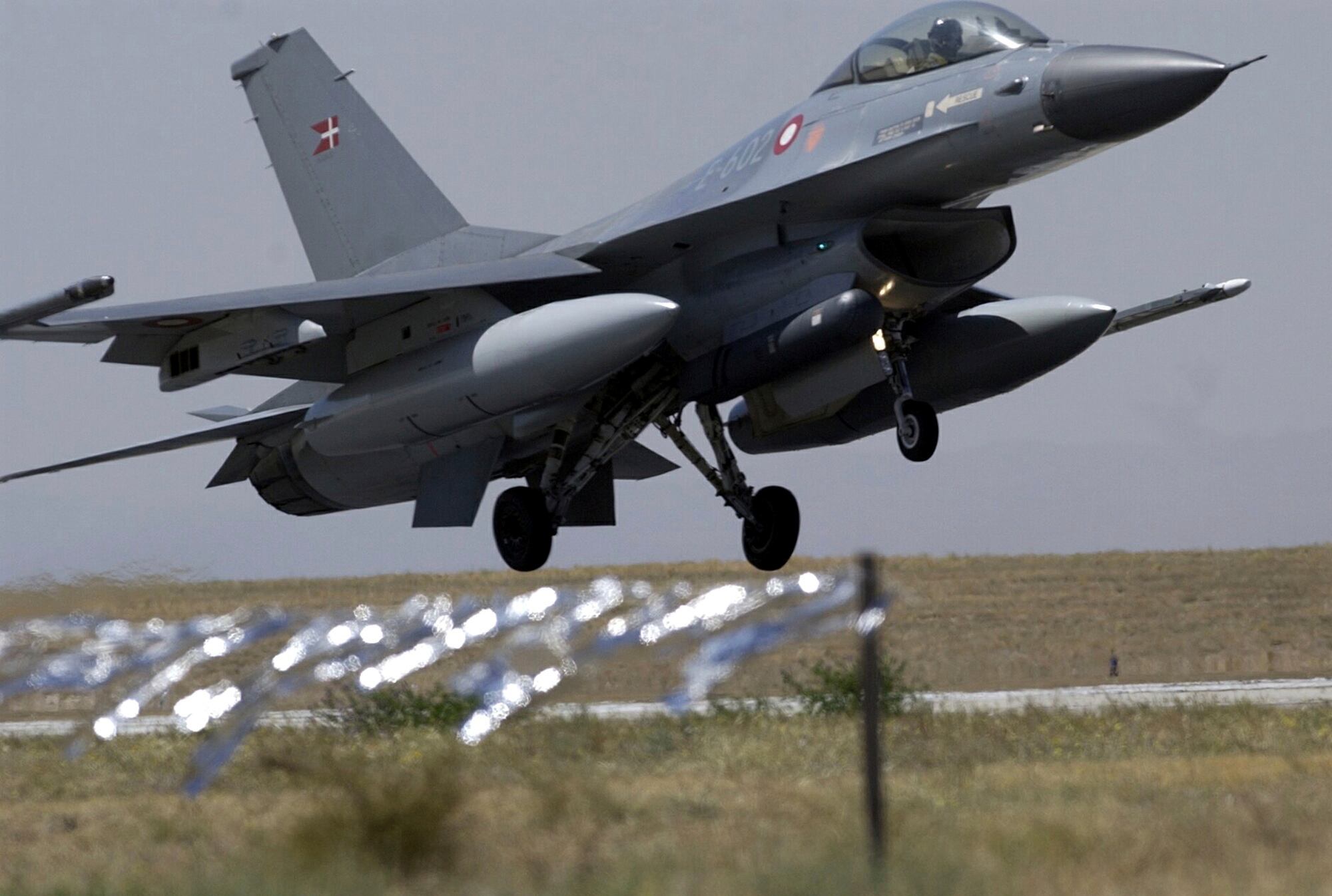 A Norwegian air force F-16 fighter lands at a Turkish air base in the Central Anatolian Turkish city of Konya on Wednesday, Sept. 8, 2004.