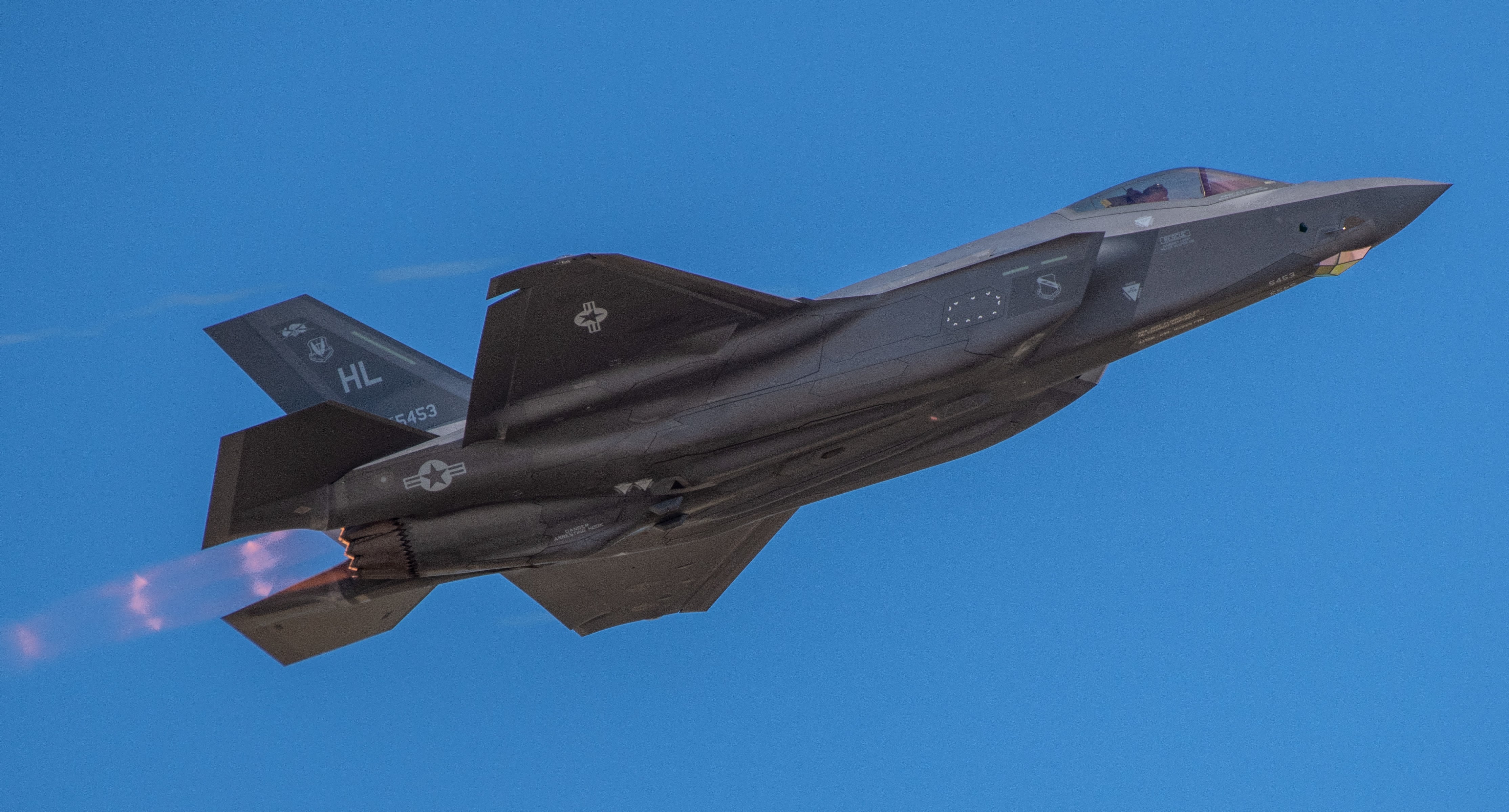 Maj. Kristen Wolfe, F-35A Lightning II Demonstration Team commander with the 388th Fighter Wing, flies over the crowd during the Warriors Over the Wasatch Air and Space Show at Hill Air Force Base, Utah, June 25, 2022. (Senior Airman Erica Webster/Air Force)