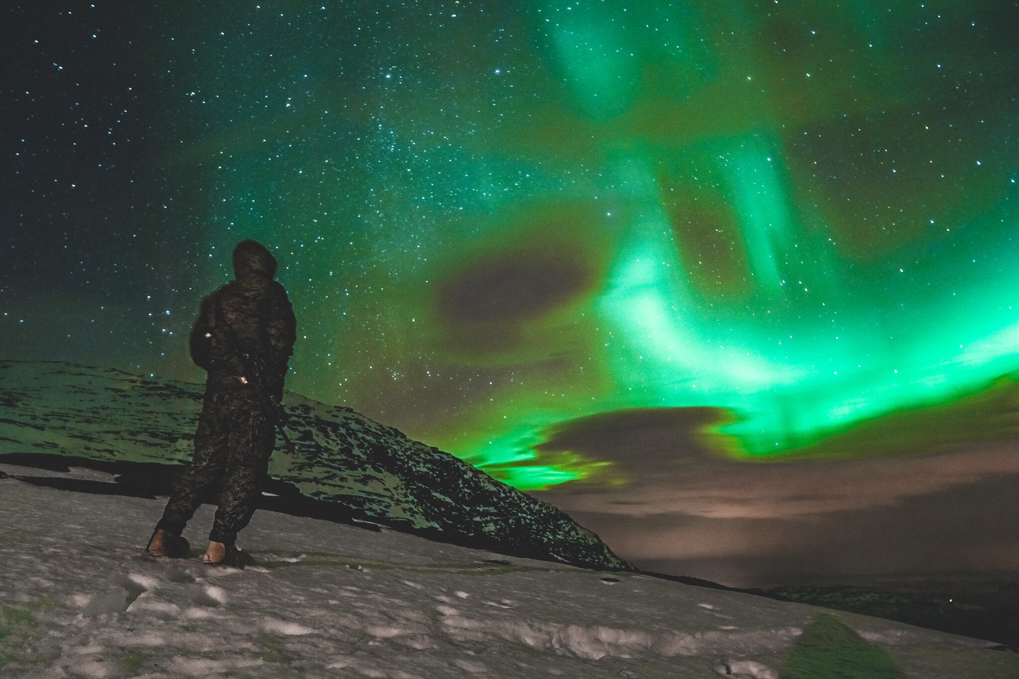 A U.S. Marine stands watch during cold-weather training in preparation for Exercise Reindeer II in Setermoen, Norway, Nov. 12, 2020.