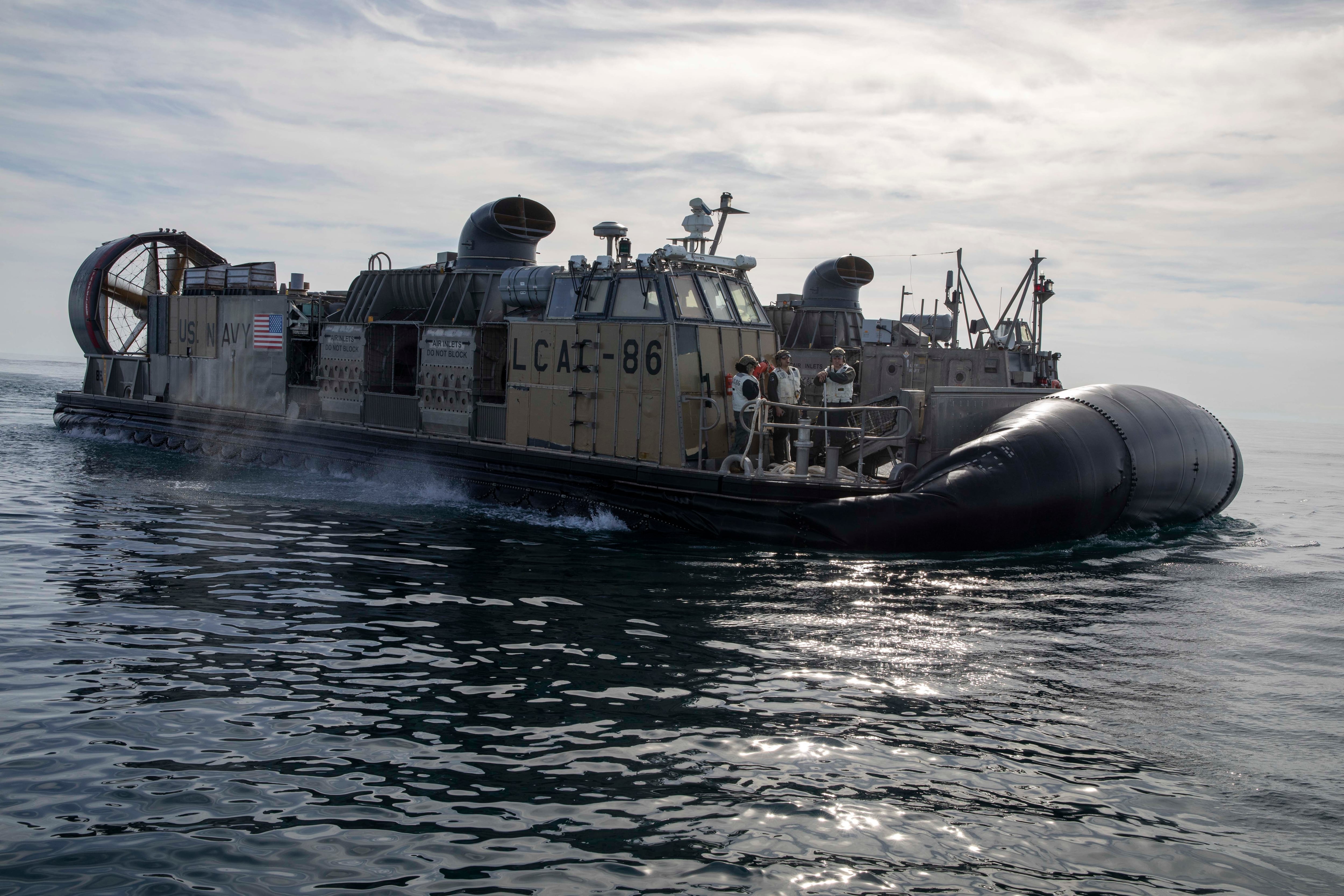 Sailors operate landing craft air cushions during recovery efforts of a high-altitude balloon in the Atlantic Ocean, Feb. 8, 2023.