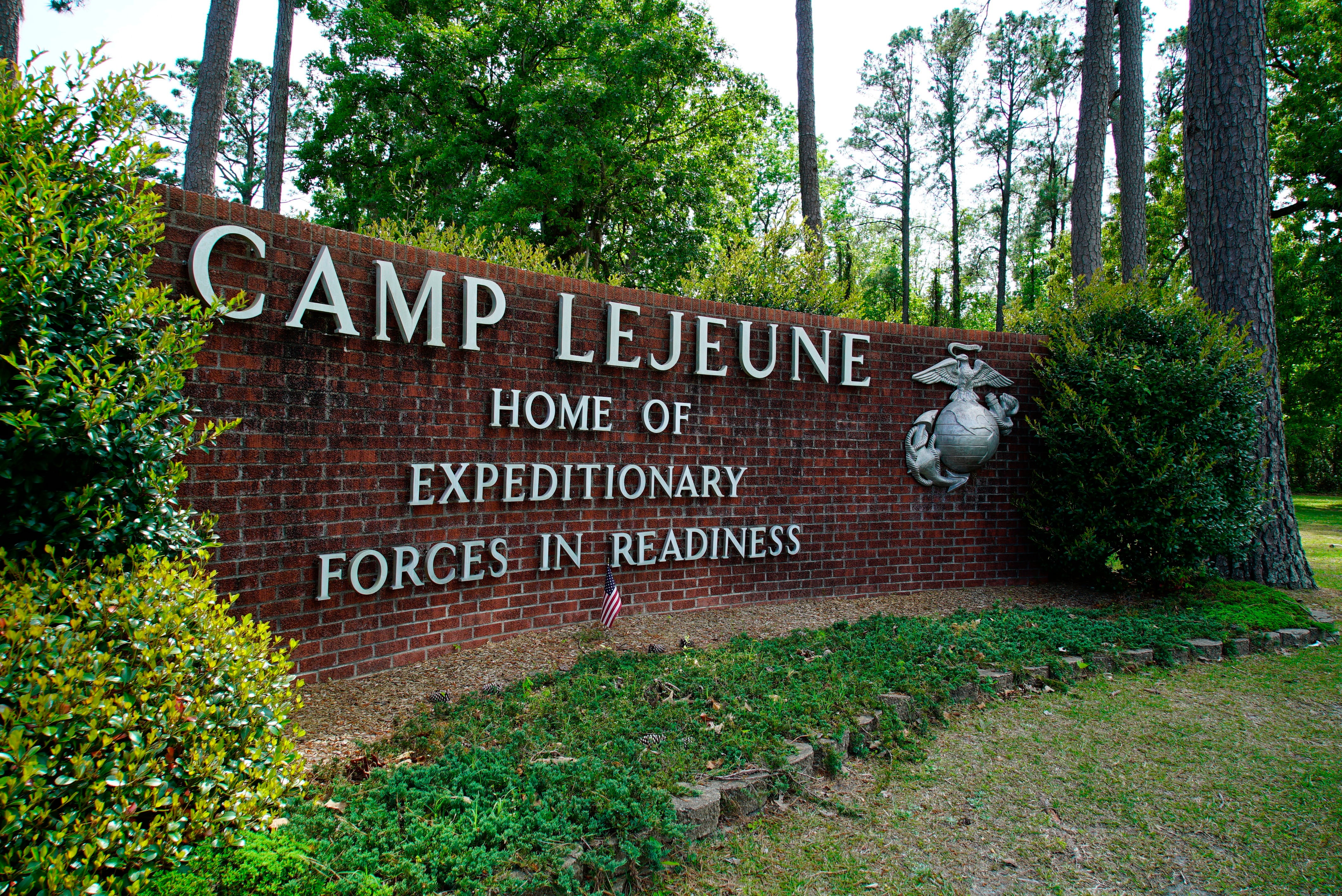 Signage stands on the main gate to Marine Corps Base Camp Lejeune outside Jacksonville, N.C., Friday, April 29, 2022.