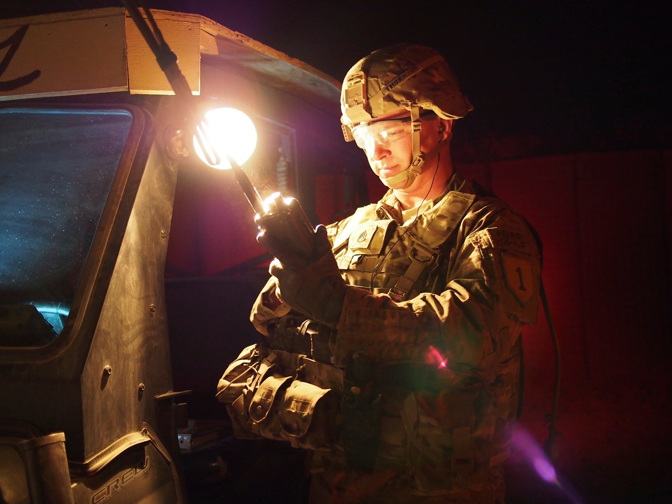 Staff Sgt. Thornton, a mortarman, conducts a radio check with his forward observer in Afghanistan on Aug. 31, 2013.