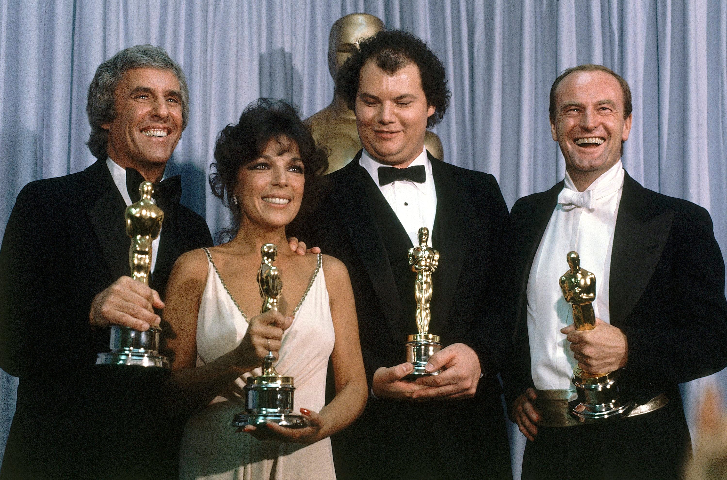 Burt Bacharach, from left, appears with Carole Bayer Sager, Christopher Cross and Peter Allen, winners of the Oscar for best original song "Arthur's Theme (Best That You Can Do)" at the 54th Annual Academy Awards in Los Angeles on March 29, 1982.