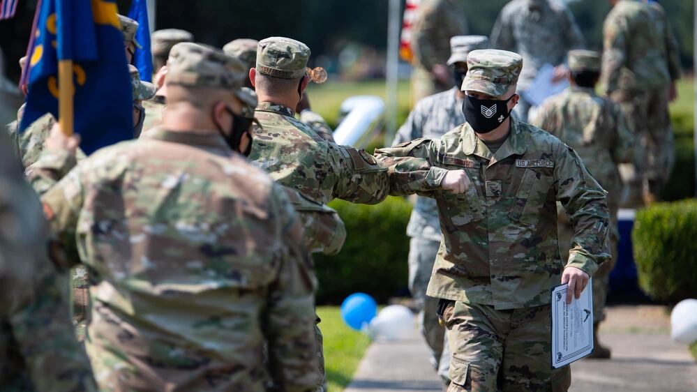 Airmen are congratulated during a staff sergeant release event at Barksdale Air Force Base, La., Oct. 1, 2020. (Airman 1st Class Jacob B. Wrightsman/Air Force)