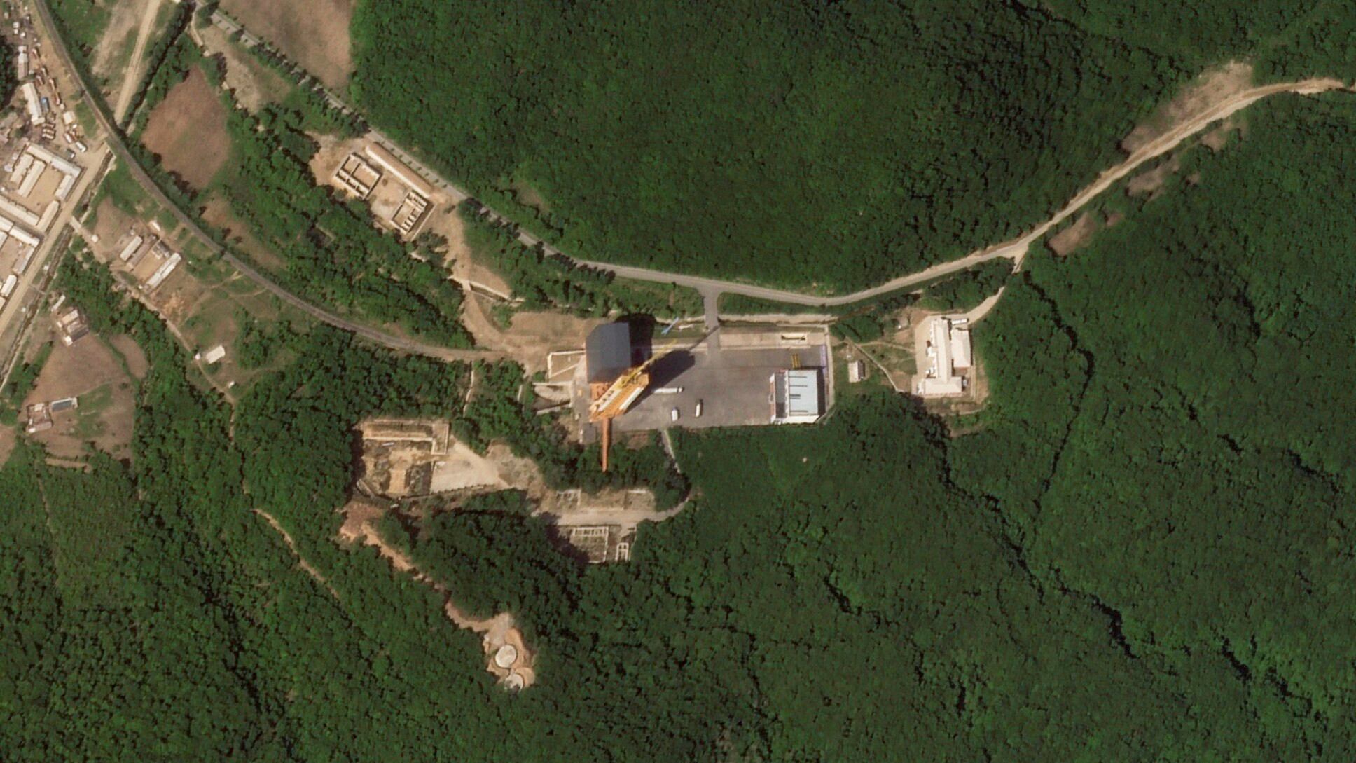 This satellite picture by Planet Labs PBC shows activity at a launch pad at the Sohae Satellite Launching Station near Tongchang-ri, North Korea, Tuesday, May 30, 2023.