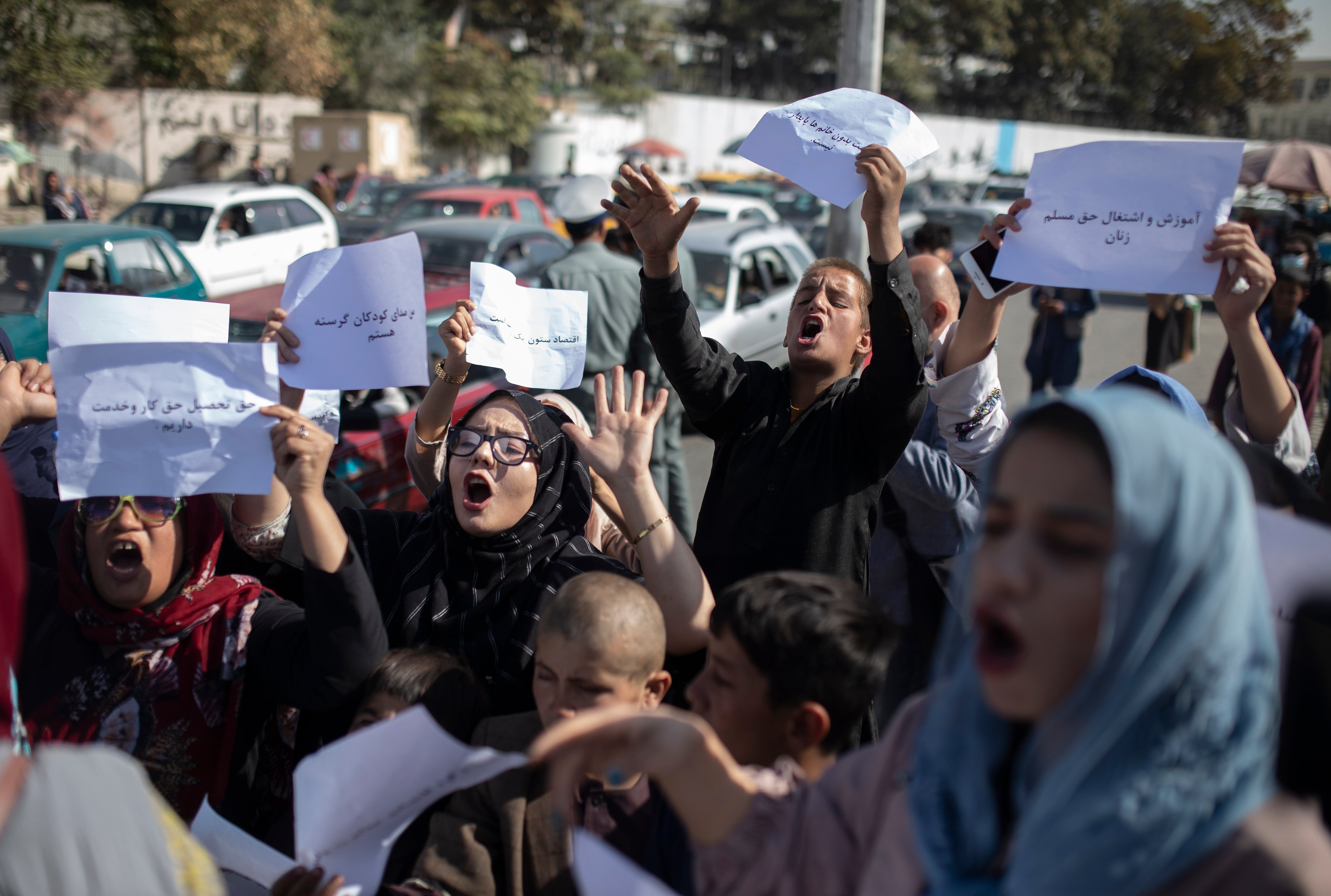 Afghan women chant during a protest in Kabul, Afghanistan, Thursday, Oct. 21, 2021.