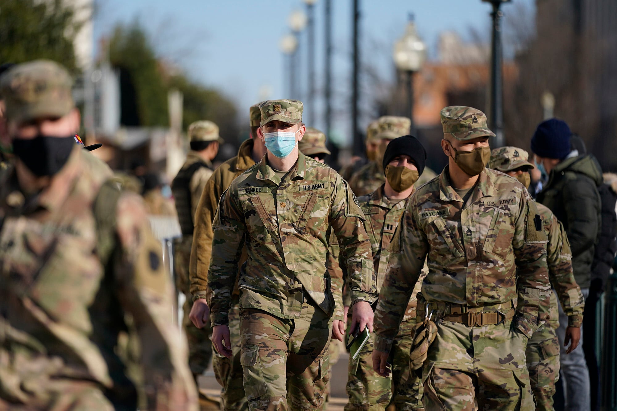 Member of the DC National Guard walk around the U.S. Capitol grounds, Thursday morning, Jan. 7, 2021 in Washington.