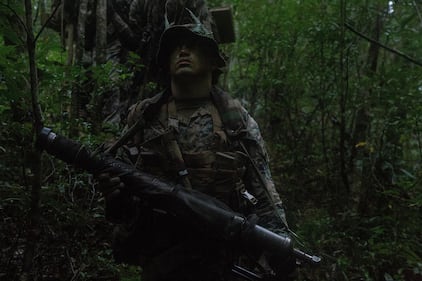 A U.S. Marine patrols during a force-on-force exercise at Camp Gonsalves, Okinawa, Japan on Oct. 16, 2020.