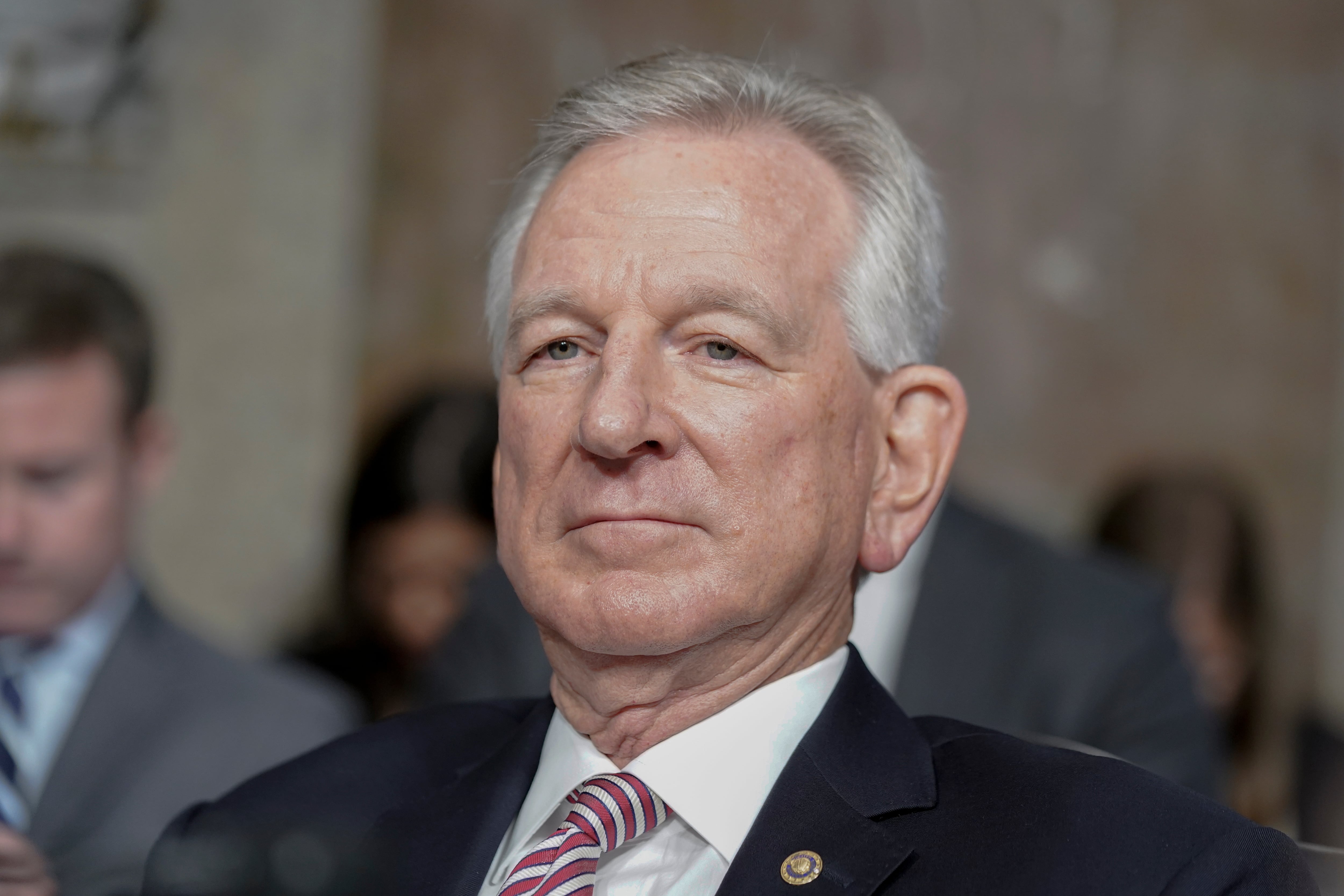 Sen. Tommy Tuberville, R-Ala., listens during the Senate Armed Services Committee hearing to examine the nomination of Army Lt. Gen. Randy George to be reappointment to the grade of general and to be Chief of Staff of the Army, July 12, 2023, on Capitol Hill in Washington.