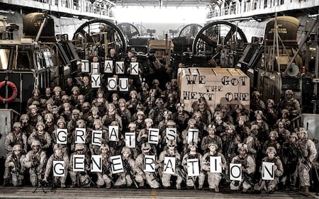 Sailors and Marines pose for a photo in a landing craft, air cushion in the well deck aboard the Wasp-class amphibious assault ship USS Kearsarge (LHD 3) on June 2, 2019, in commemoration of the 75th anniversary of Operation Neptune, the amphibious landing on the beaches in Normandy, France on D-Day, June 6, 1944.